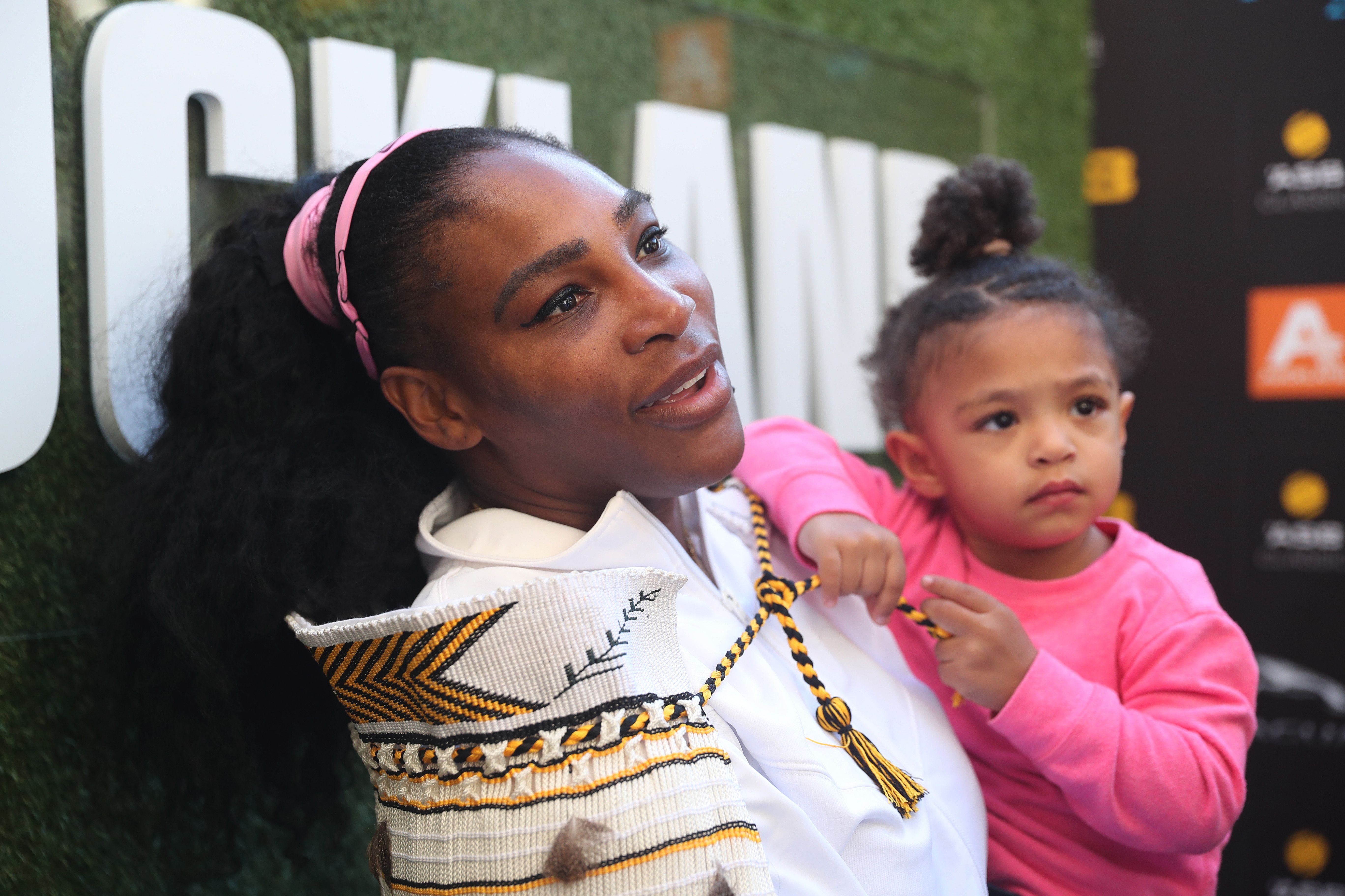 Tennis player Serena Williams holders her daughter Olympia