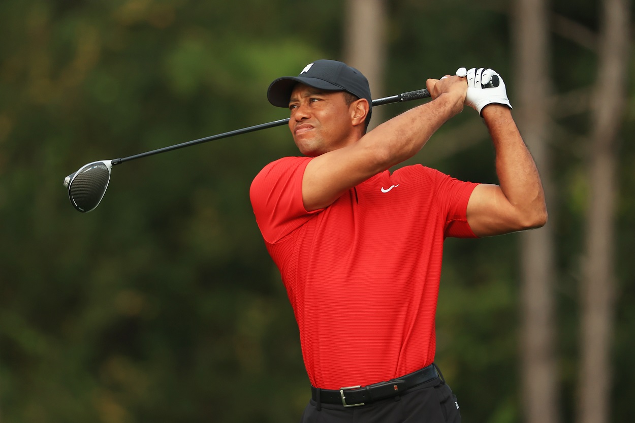 Tiger Woods tees off in the final round of the 2020 PNC Championship