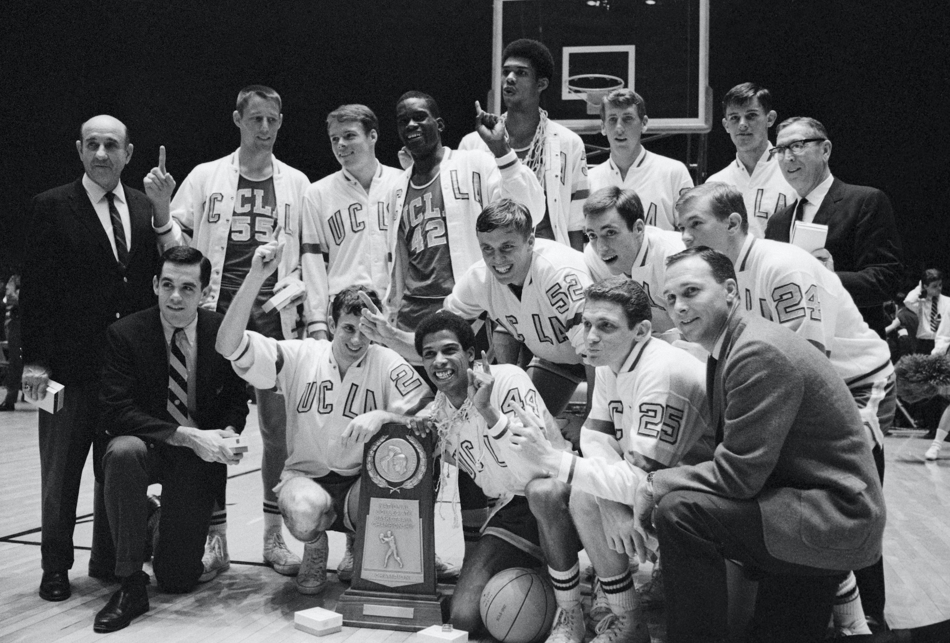 The UCLA Bruins men's basketball team celebrates winning the NCAA championship in 1967.