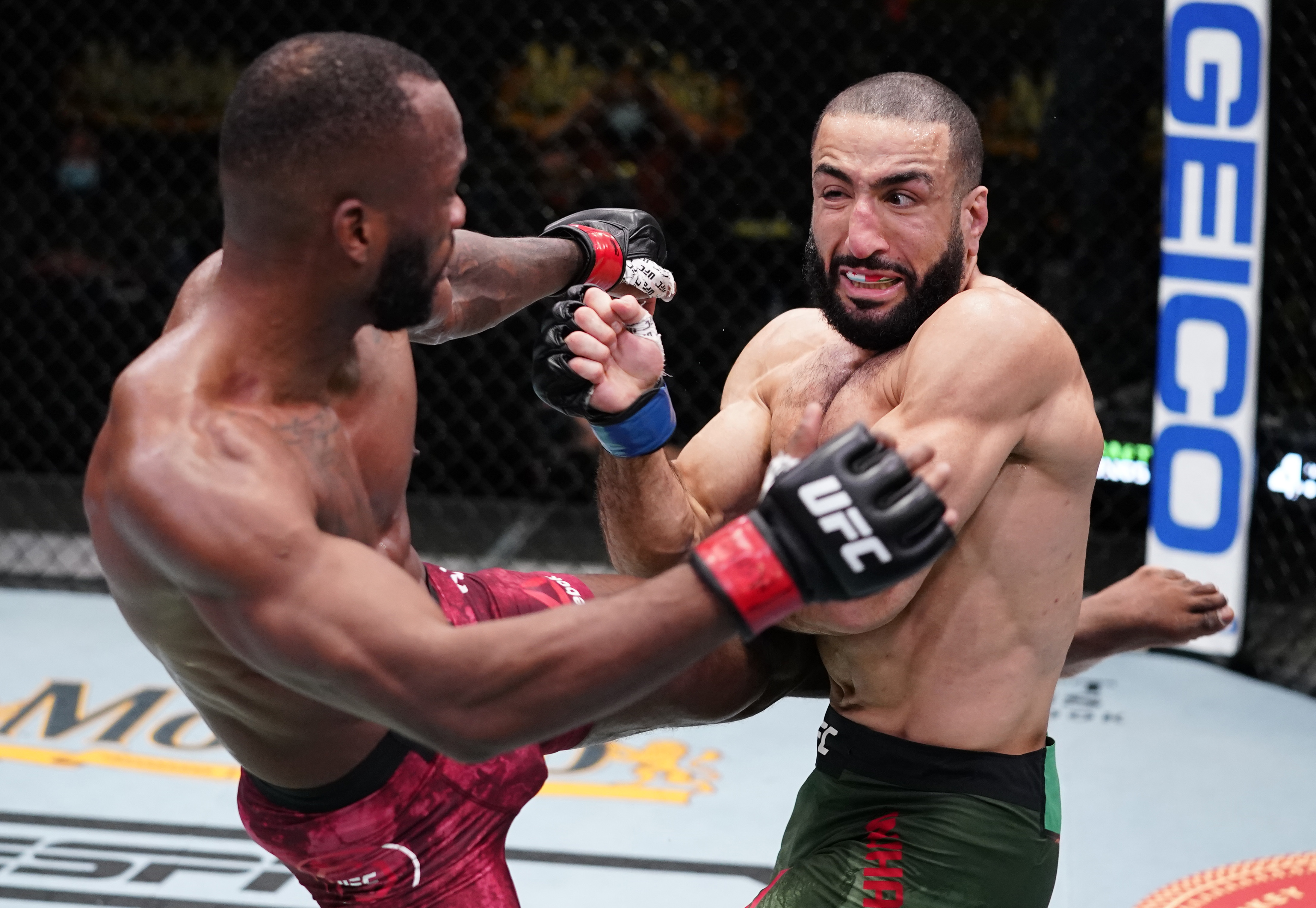 Leon Edwards kicks Belal Muhammad in a welterweight fight