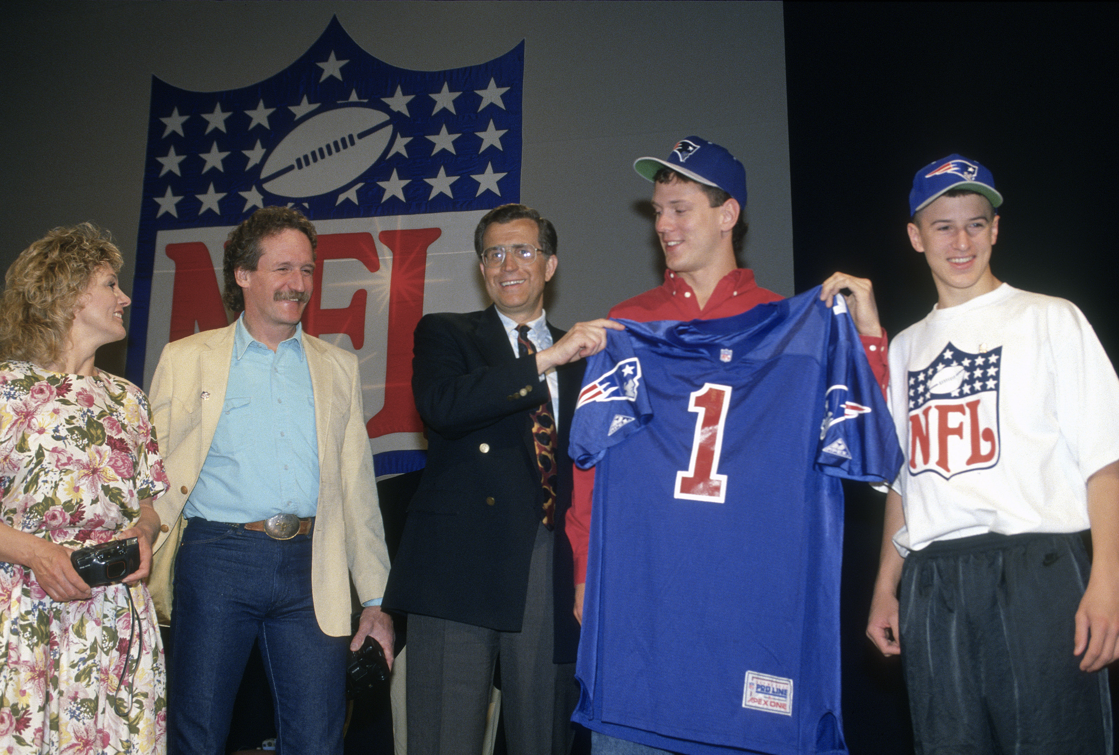 NFL Commissioner Paul Tagliabue stands with Drew Bledsoe, the No. 1 draft pick of the New England Patriots at the 1993 NFL draft