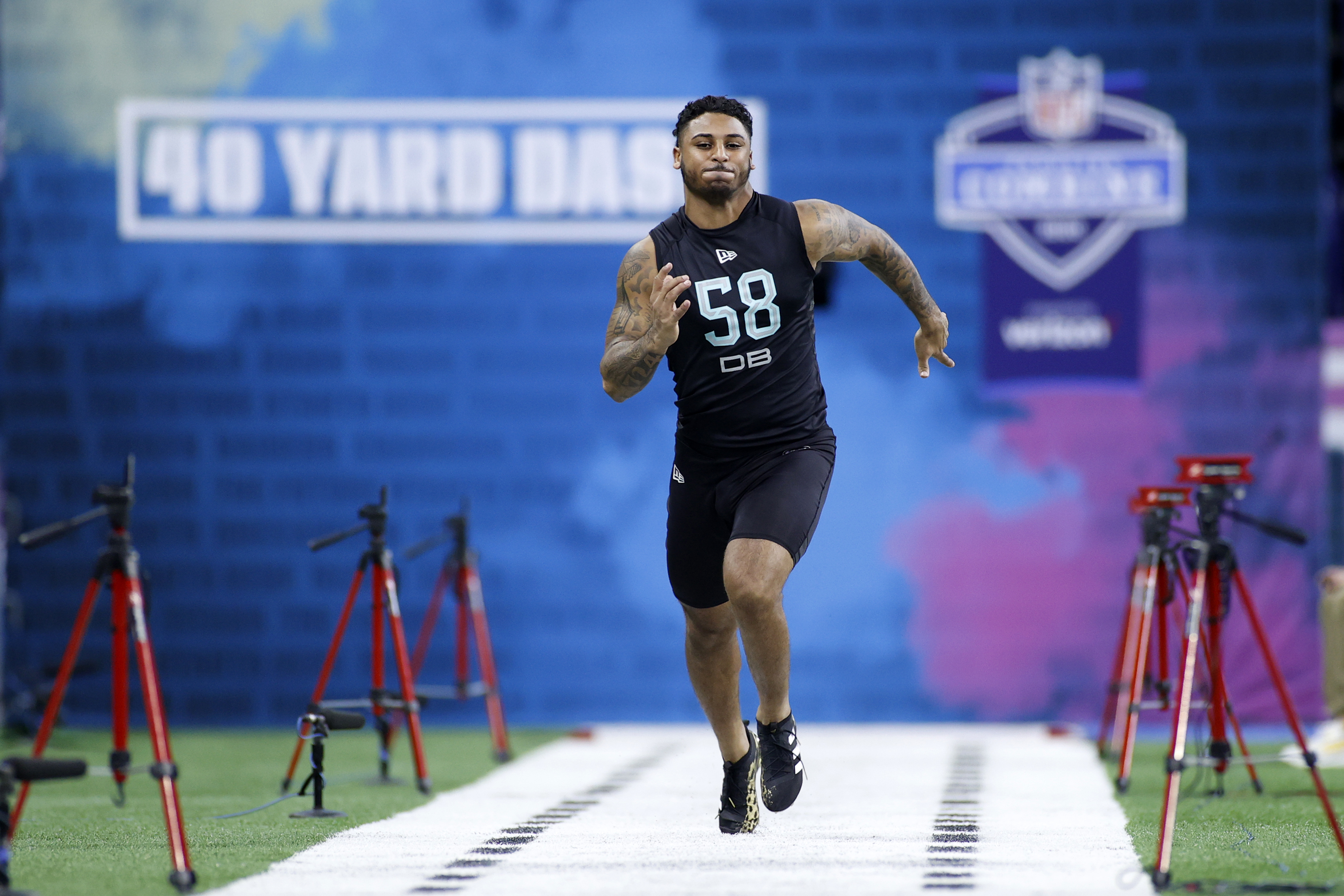 Defensive back Geno Stone of Iowa runs the 40-yard dash during the 2020 NFL Combine
