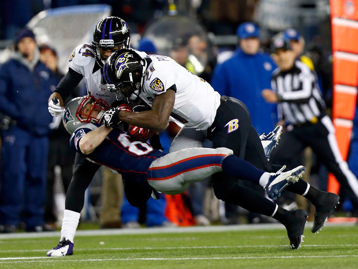 Bernard Pollard makes a physical tackle against the New England Patriots during a 2013 playoff game.