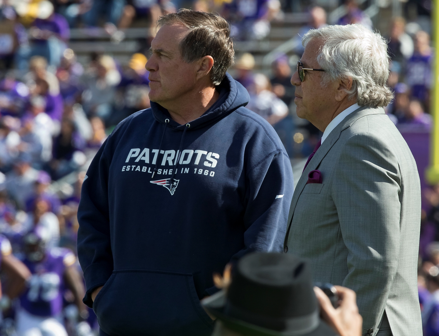 Bill Belichick stands next to New England Patriots owner Robert Kraft before a game against the Minnesota Vikings.