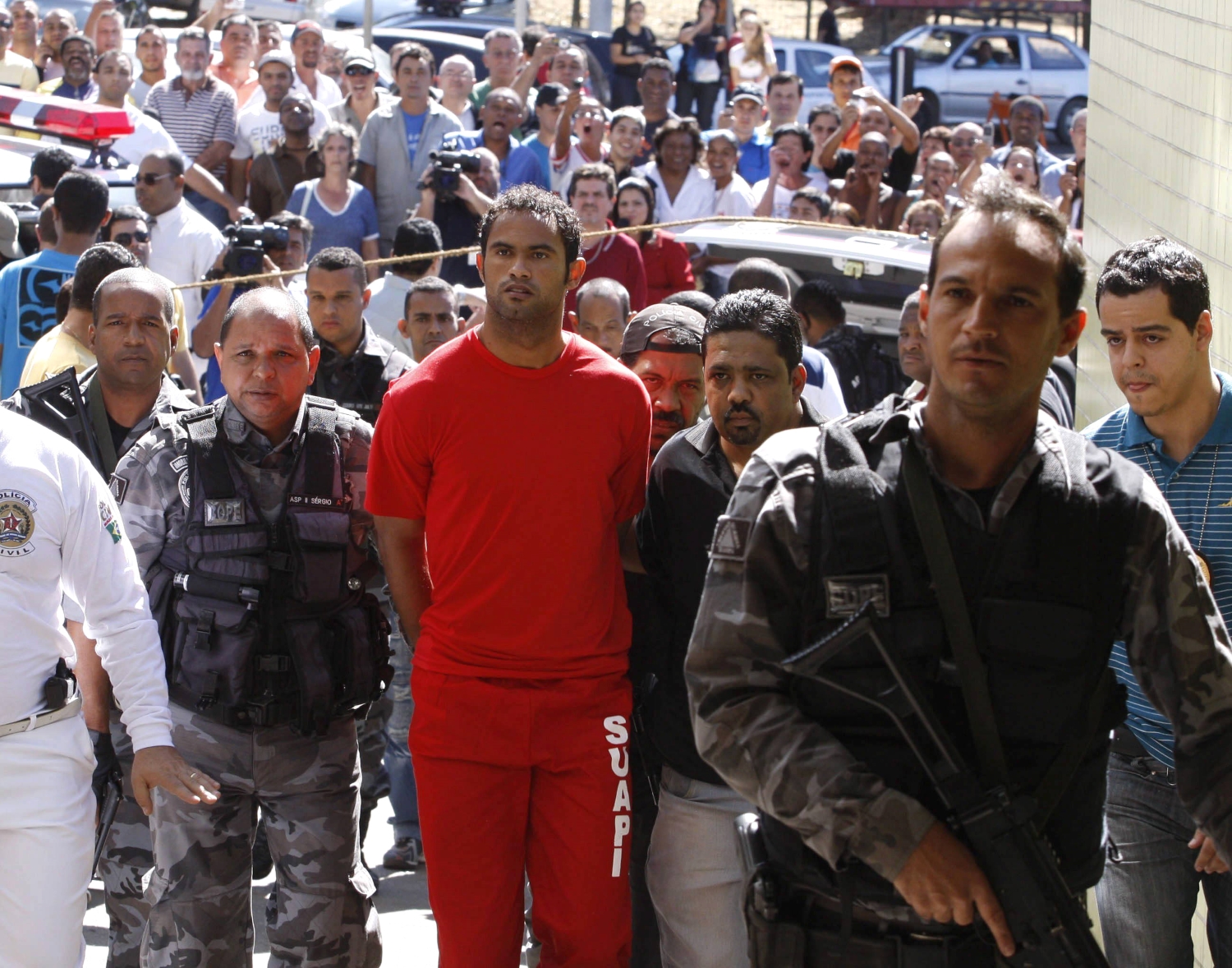 Bruno Fernandes de Souza is taken into custody on July 9, 2010.