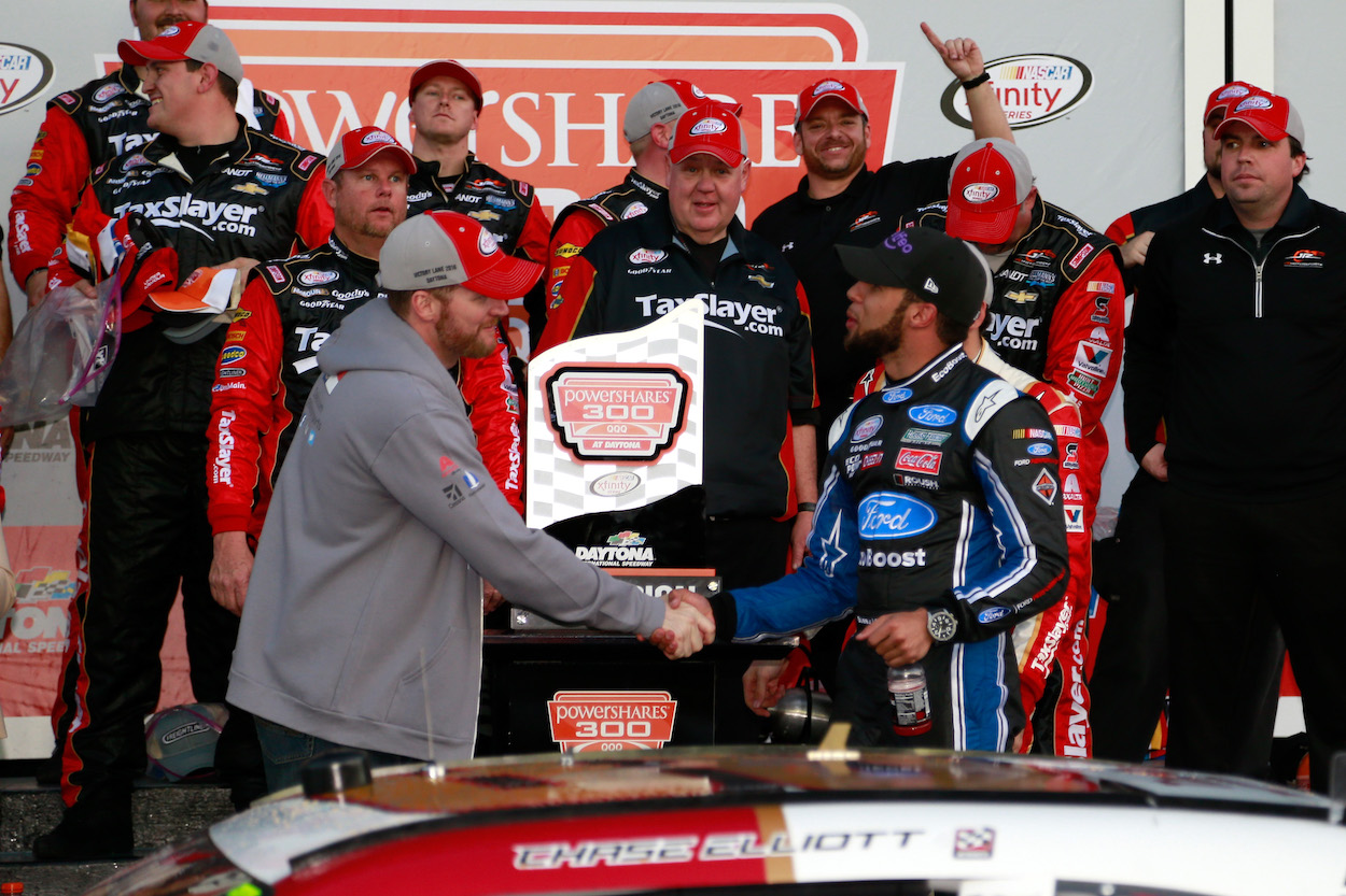 Dale Earnhardt Jr. shakes hands with Bubba Wallace