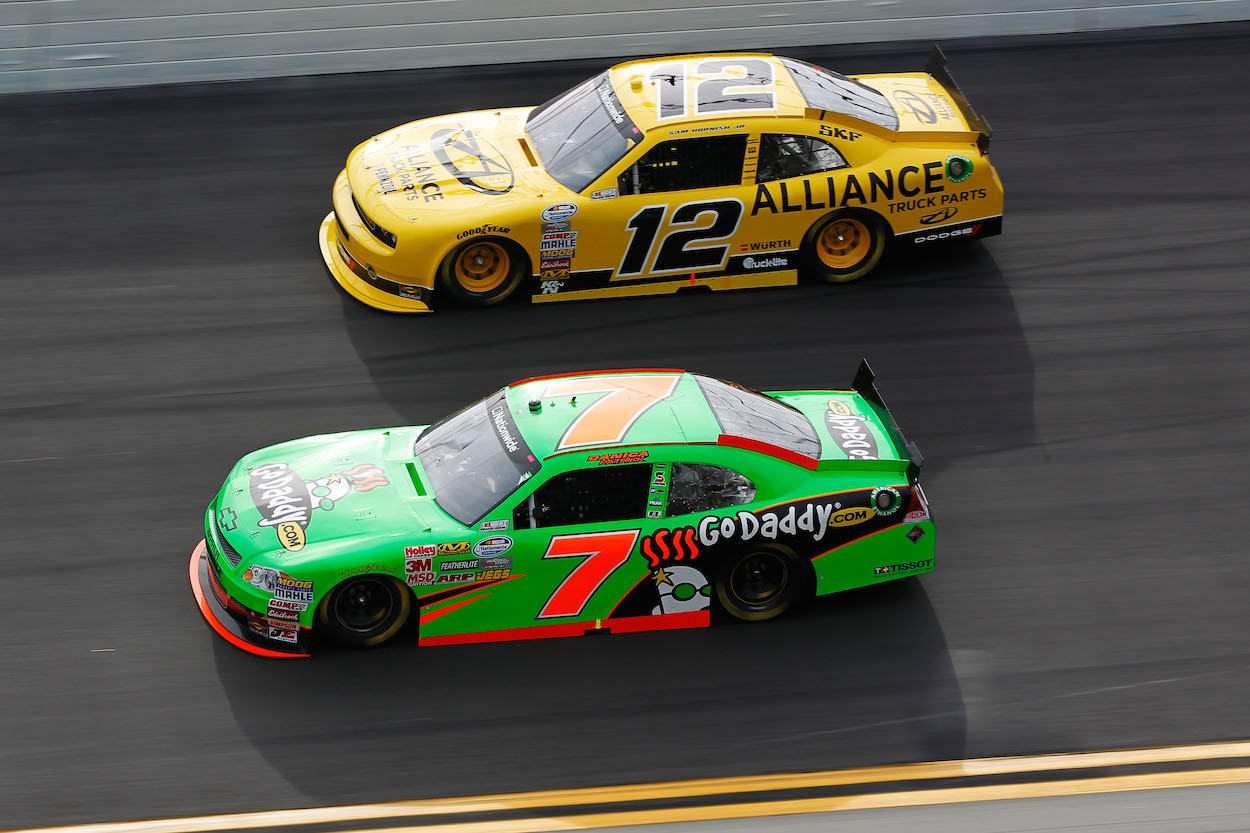 Danica Patrick and Sam Hornish Jr. battle each other at Daytona