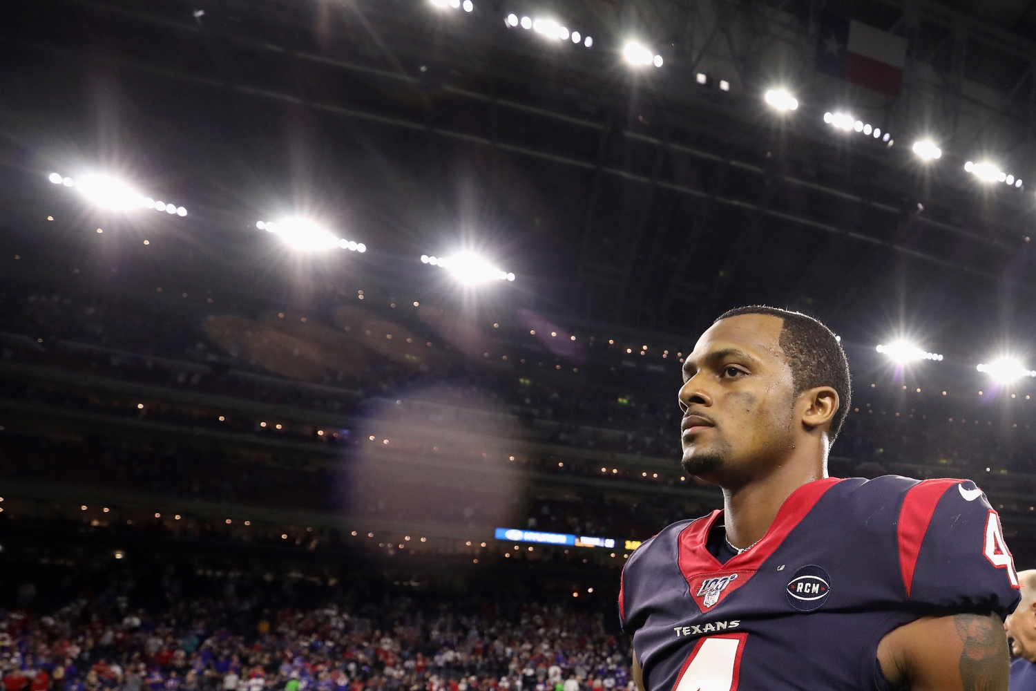 Deshaun Watson walks off the field after the Houston Texans lost to the Buffalo Bills in the playoffs on Jan. 4, 2020.