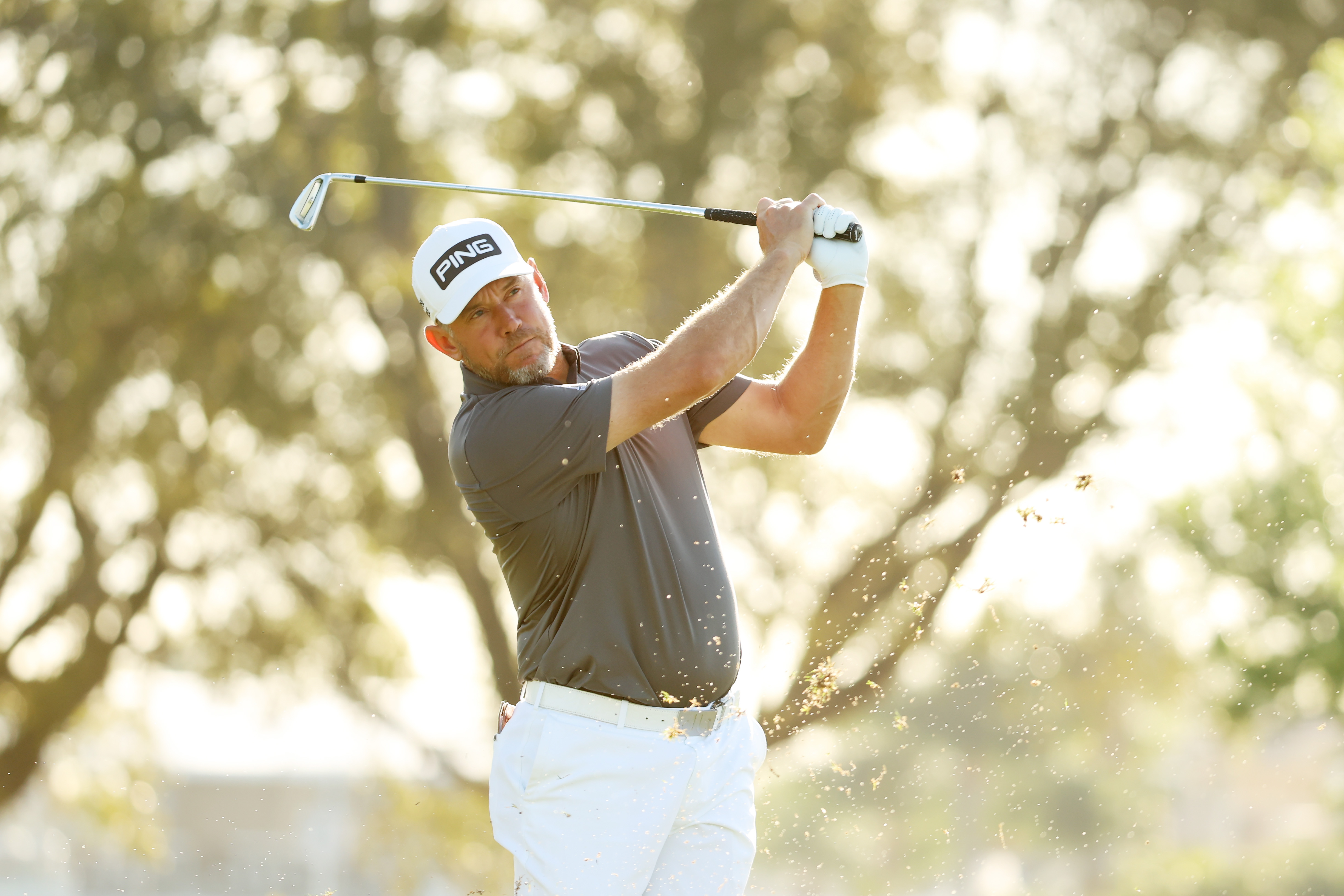 Lee Westwood plays a shot prior to The Honda Classic in 2021