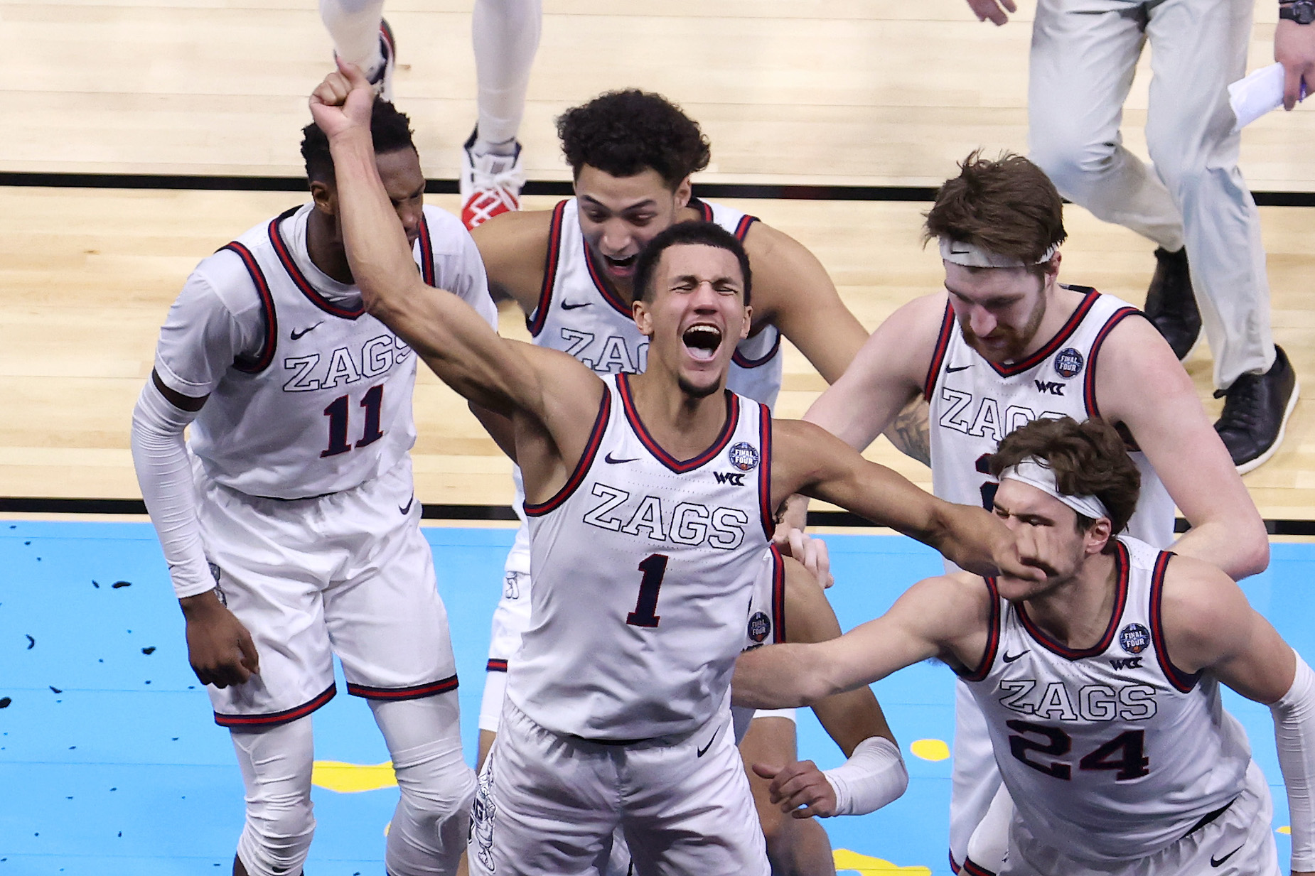 Jalen Suggs and the Gonzaga Bulldogs celebrate their win over UCLA, which kept their undefeated season alive.