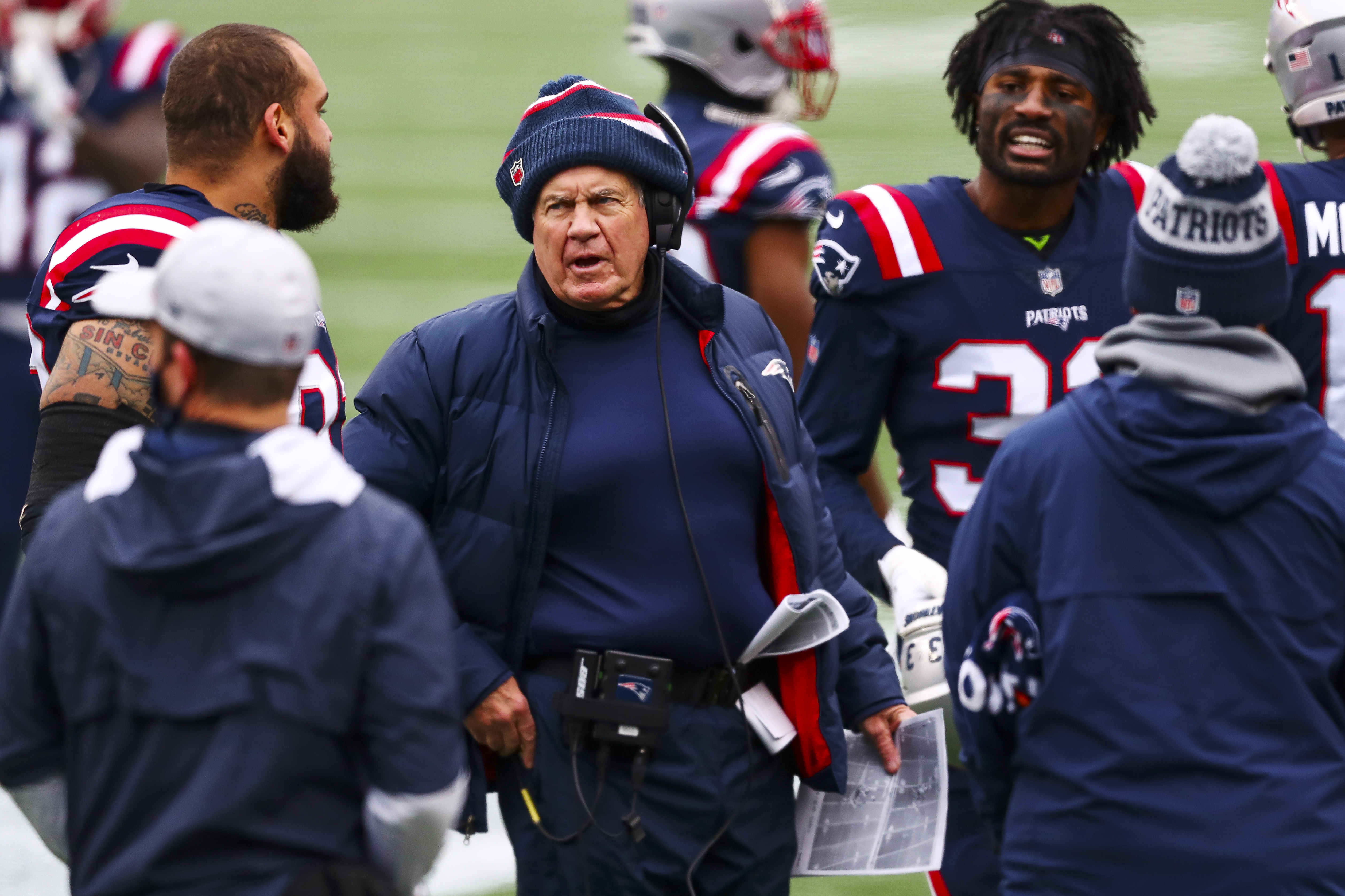 Head coach Bill Belichick of the New England Patriots looks on during a game