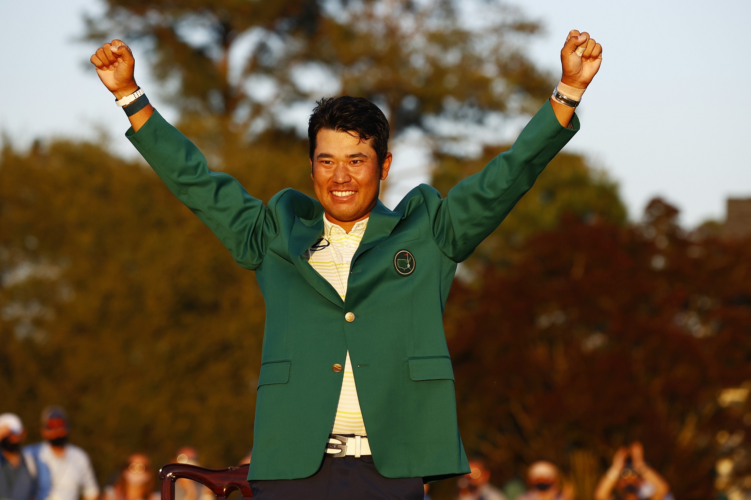 Hideki Matsuyama celebrates during the Green Jacket ceremony after winning The Masters at Augusta National Golf Club. | Jared C. Tilton/Getty Images