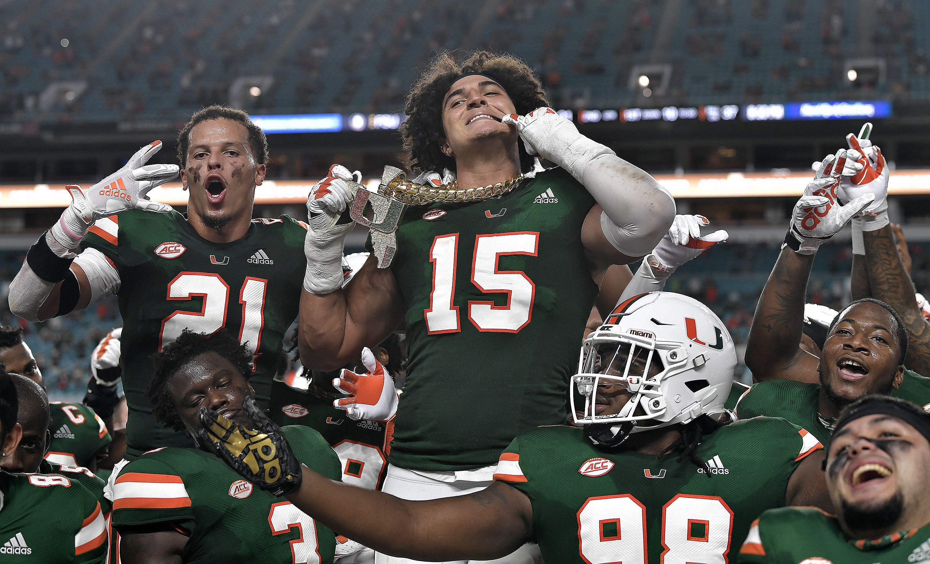 Miami lineman and NFL draft prospect Jaelan Phillips displays the tunover chain after intercepting a Florida State pass during the first half of their game on Saturday, September 26, 2020.