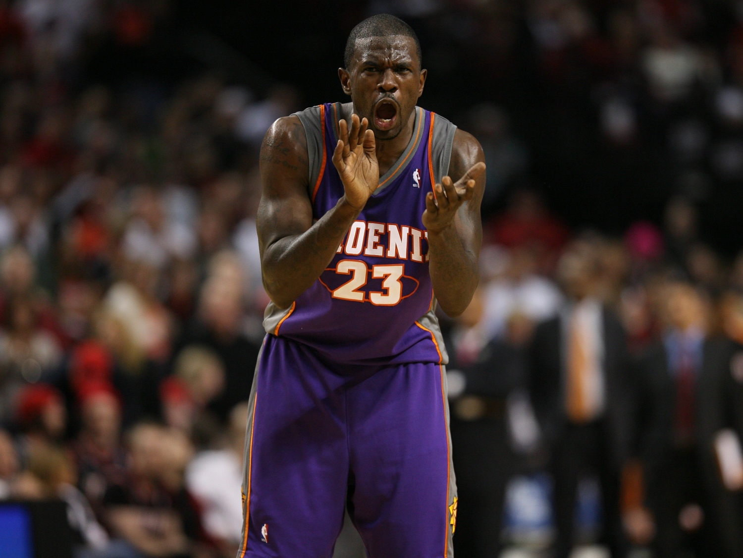 Phoenix Suns forward Jason Richardson cheers on his team during a game.