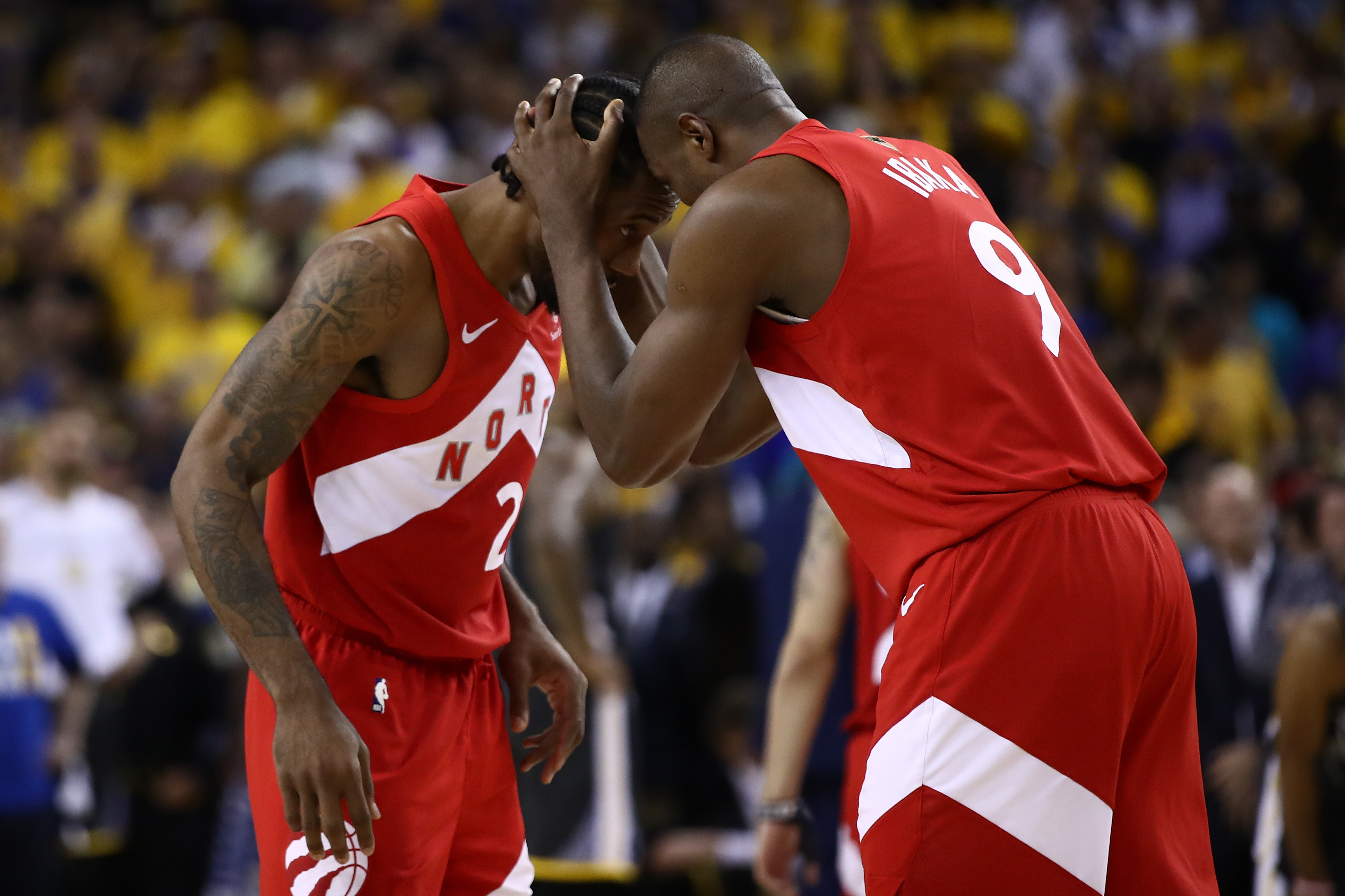 Kawhi Leonard and Serge Ibaka of the Toronto Raptors celebrate a win