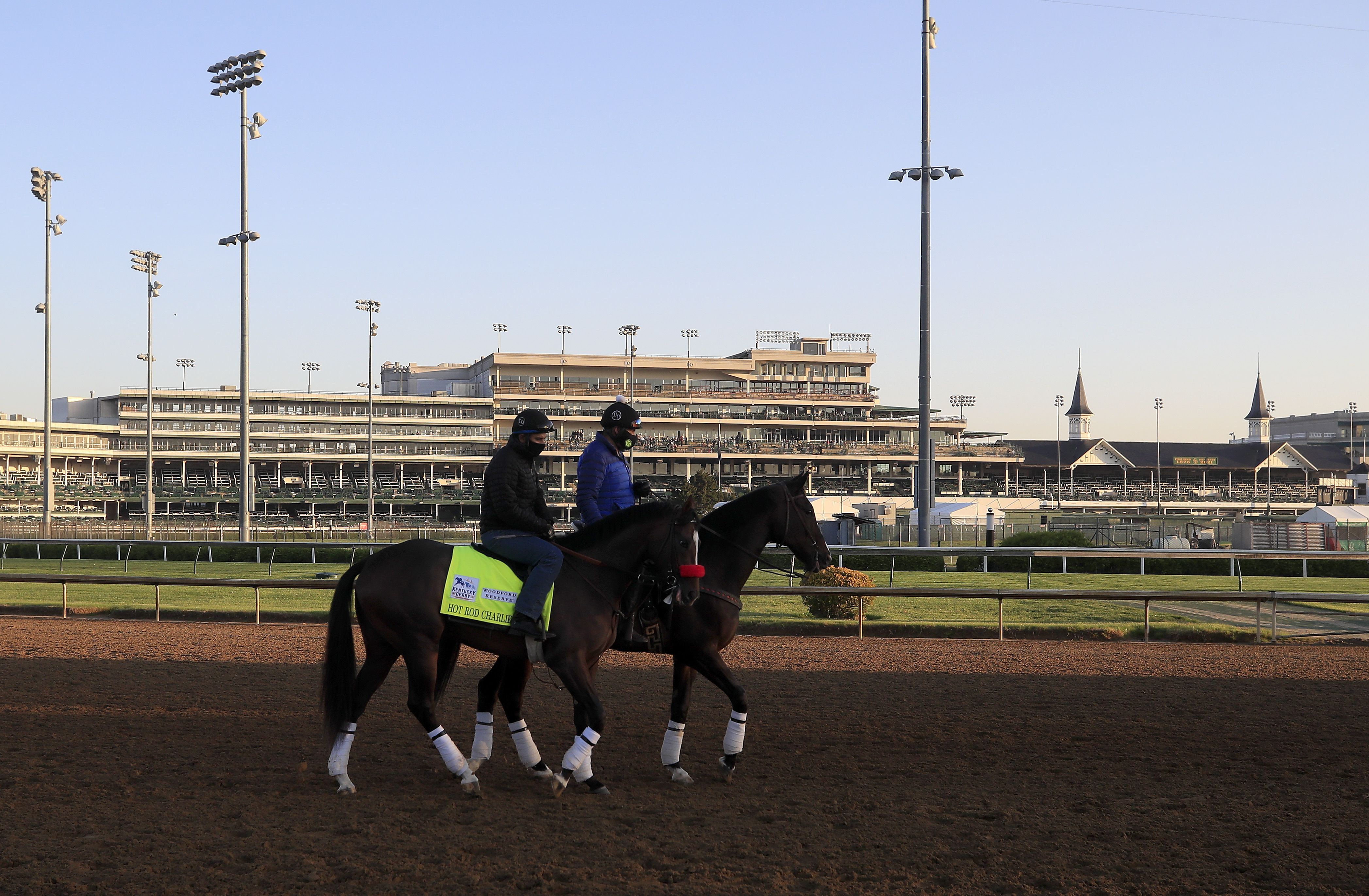 Hot Rod Charlie walks on the track during training for the Kentucky Derby at Churchill Downs on April 26, 2021