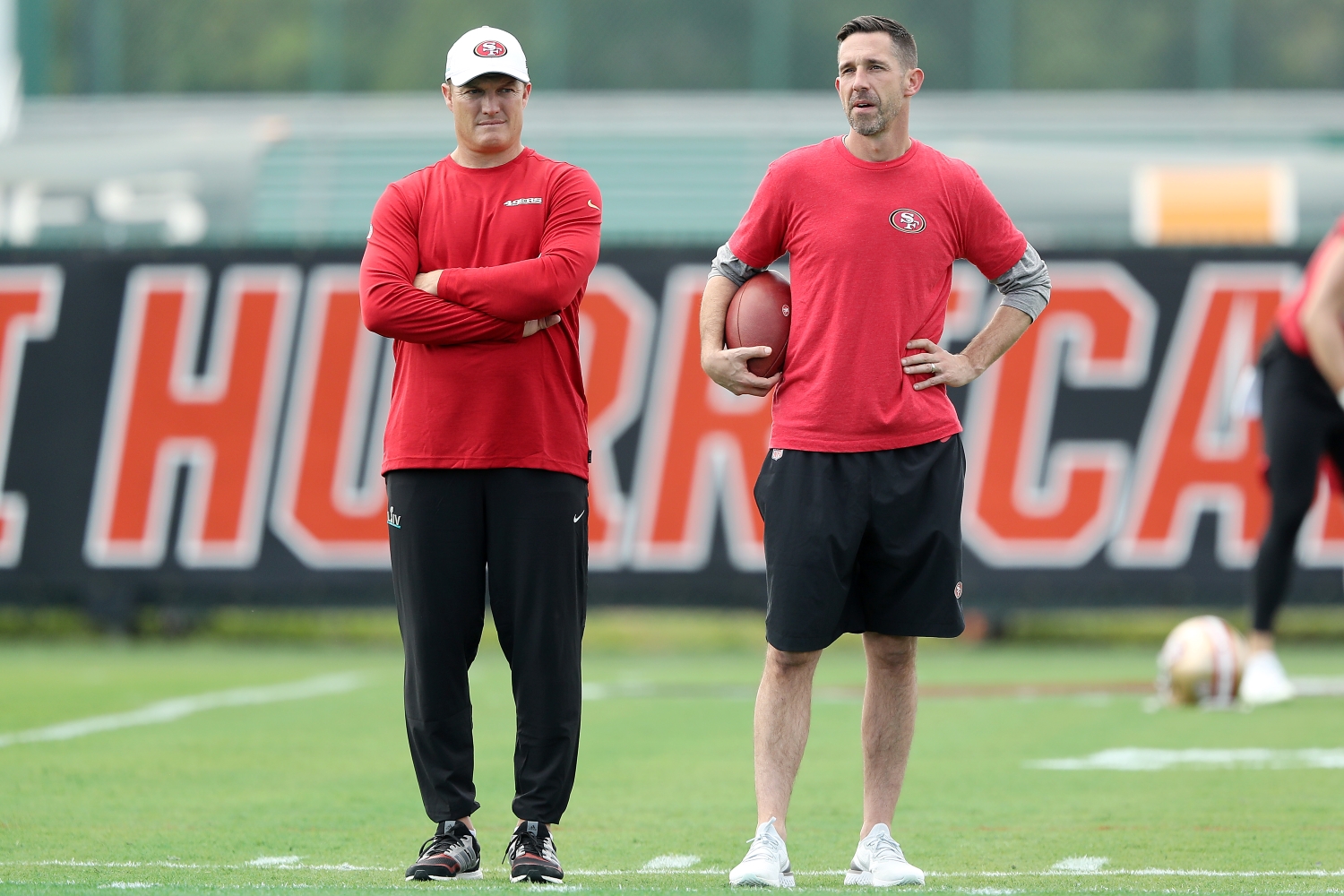 San Francisco 49ers general manager and former NFL star John Lynch stands next to head coach Kyle Shanahan.