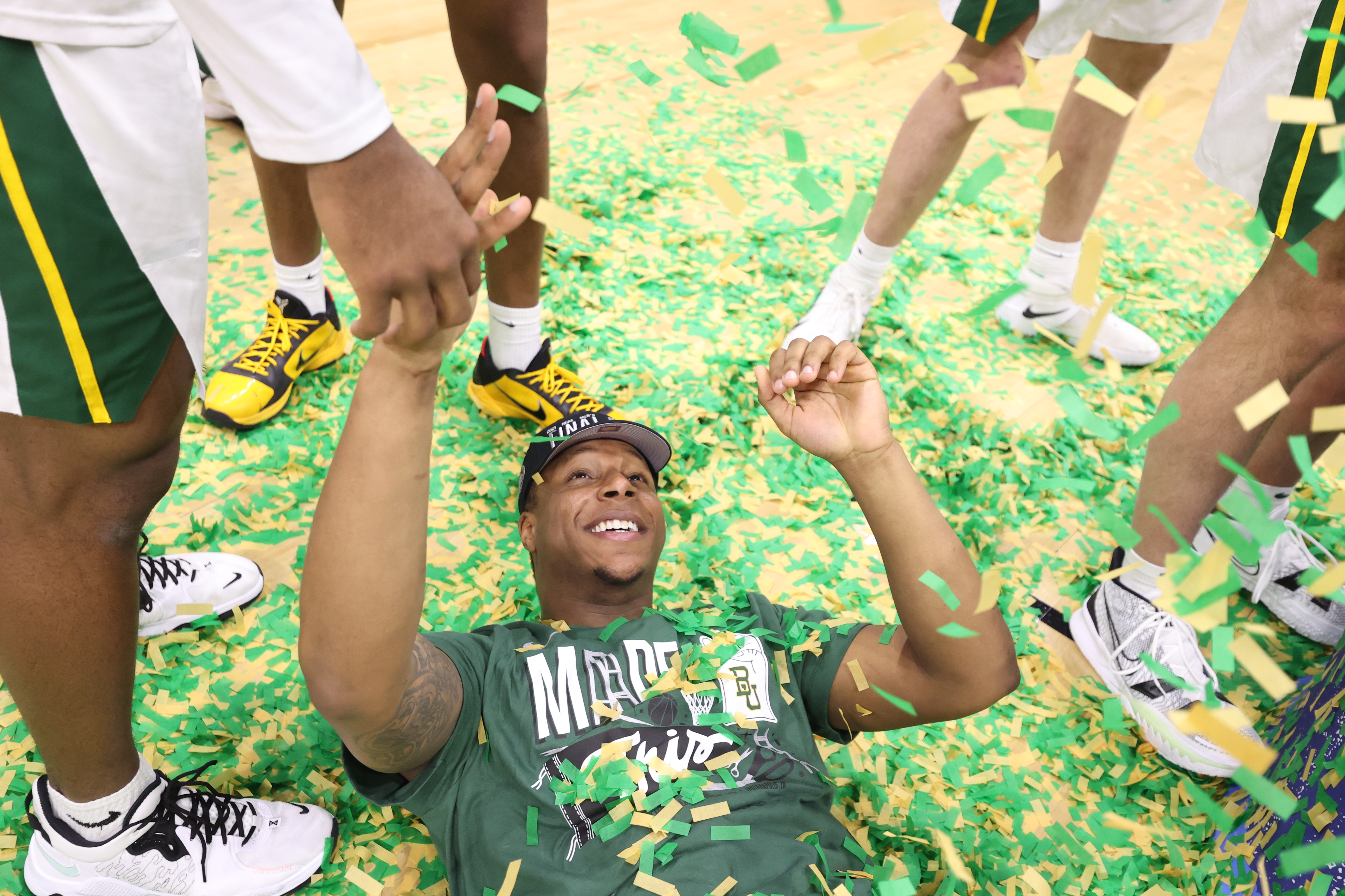Mark Vital of the Baylor Bears celebrates his team's win over the Arkansas Razorbacks in the Elite Eight round of 2021 March Madness