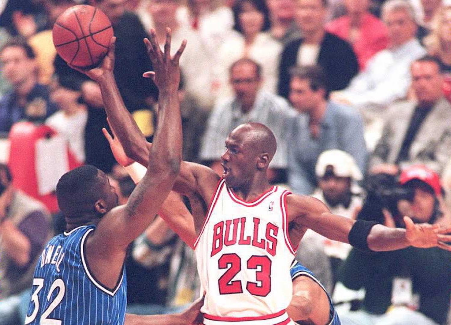 Michael Jordan and Shaquille O'Neal meet in NBA action in 1995.