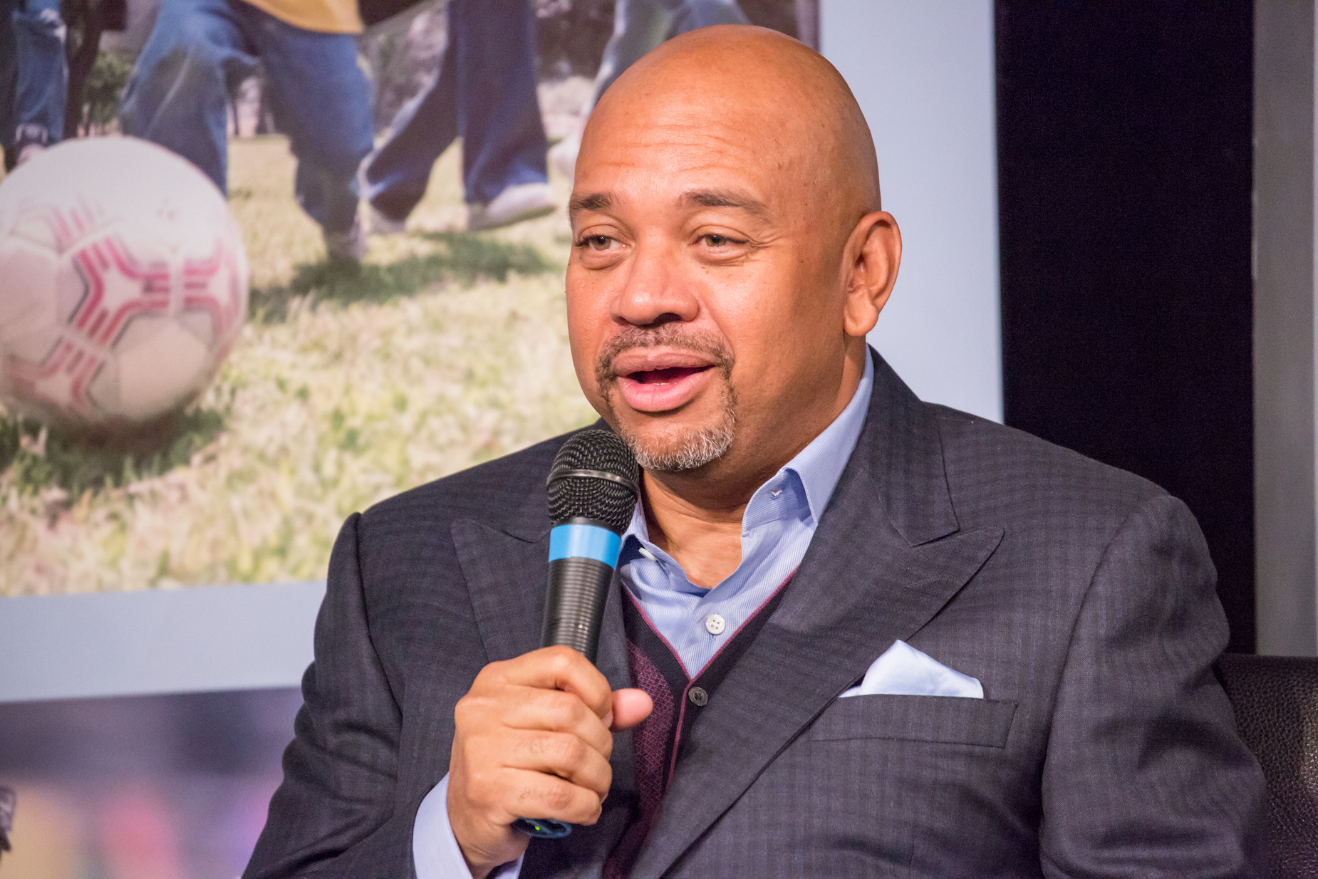 ESPN personality Mike Wilbon speaking in 2016