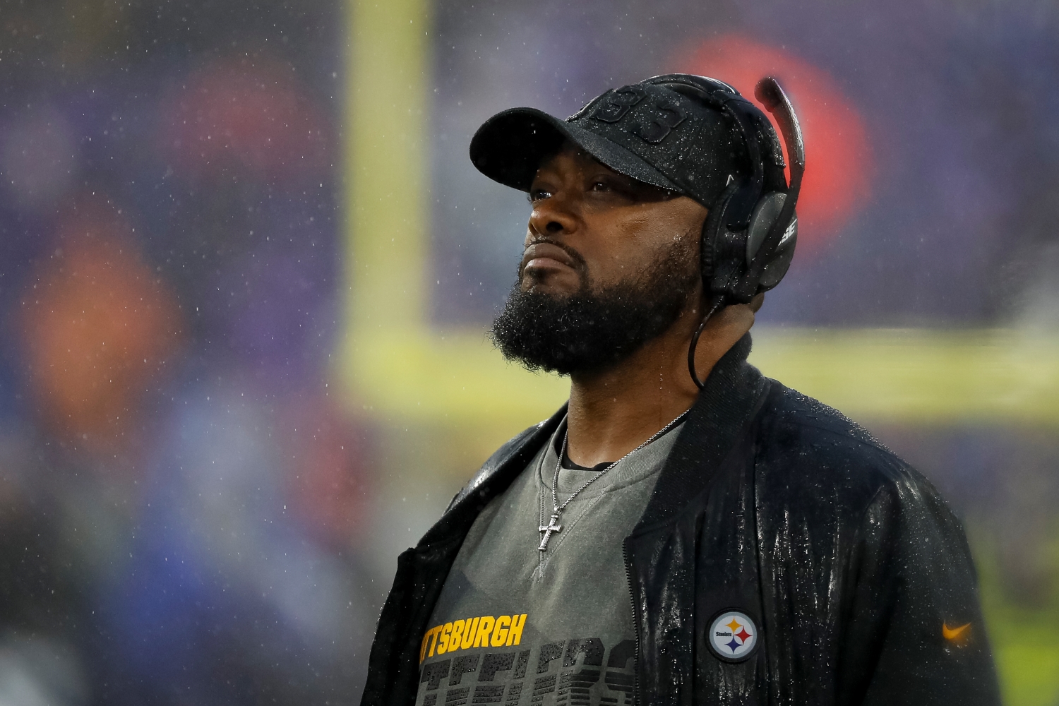 Pittsburgh Steelers coach Mike Tomlin looks up during a game.