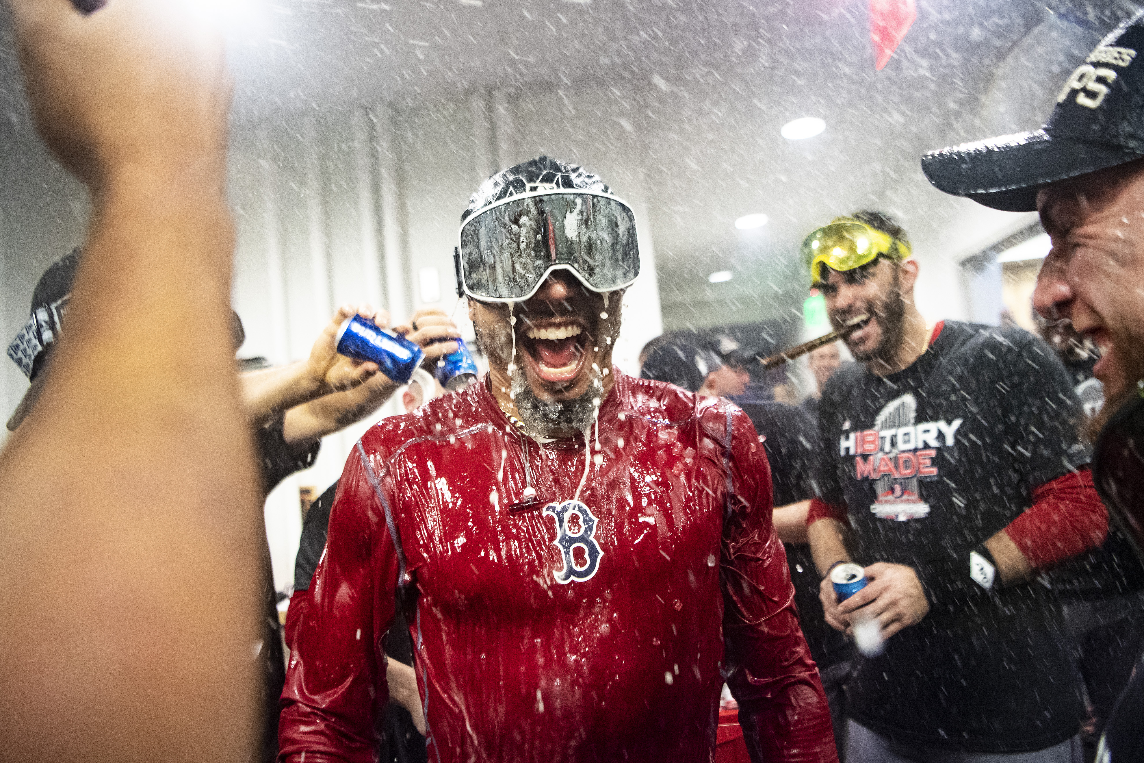 Mookie Betts of the Boston Red Sox celebrates in the clubhouse after winning the 2018 World Series in game five of the 2018 World Series