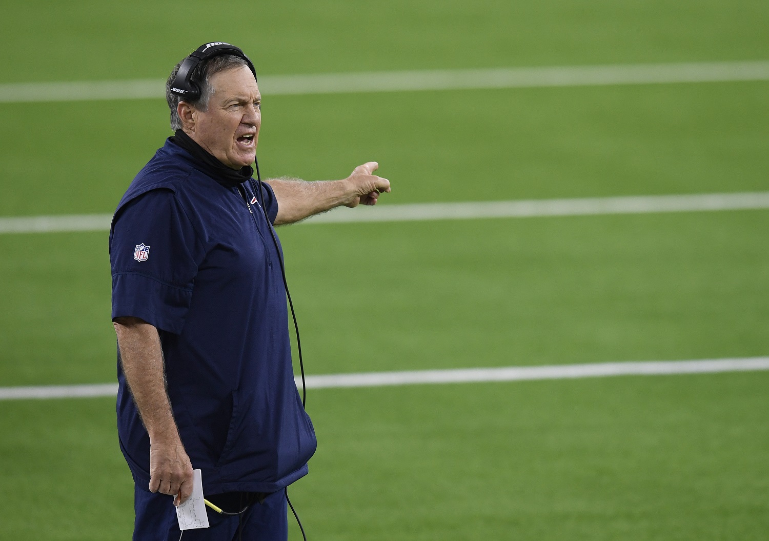 New England Patriots coach Bill Belichick complains to officials during a 24-3 loss to the Los Angeles Rams on Dec. 10, 2020, in Inglewood, California. | Photo by Harry How/Getty Images