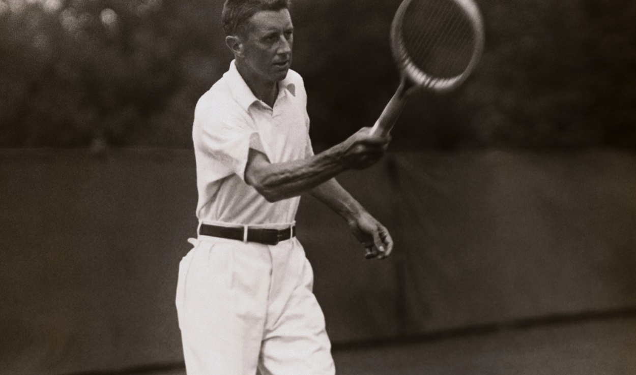 R. Norris Williams hits a shot at the Davis Cup
