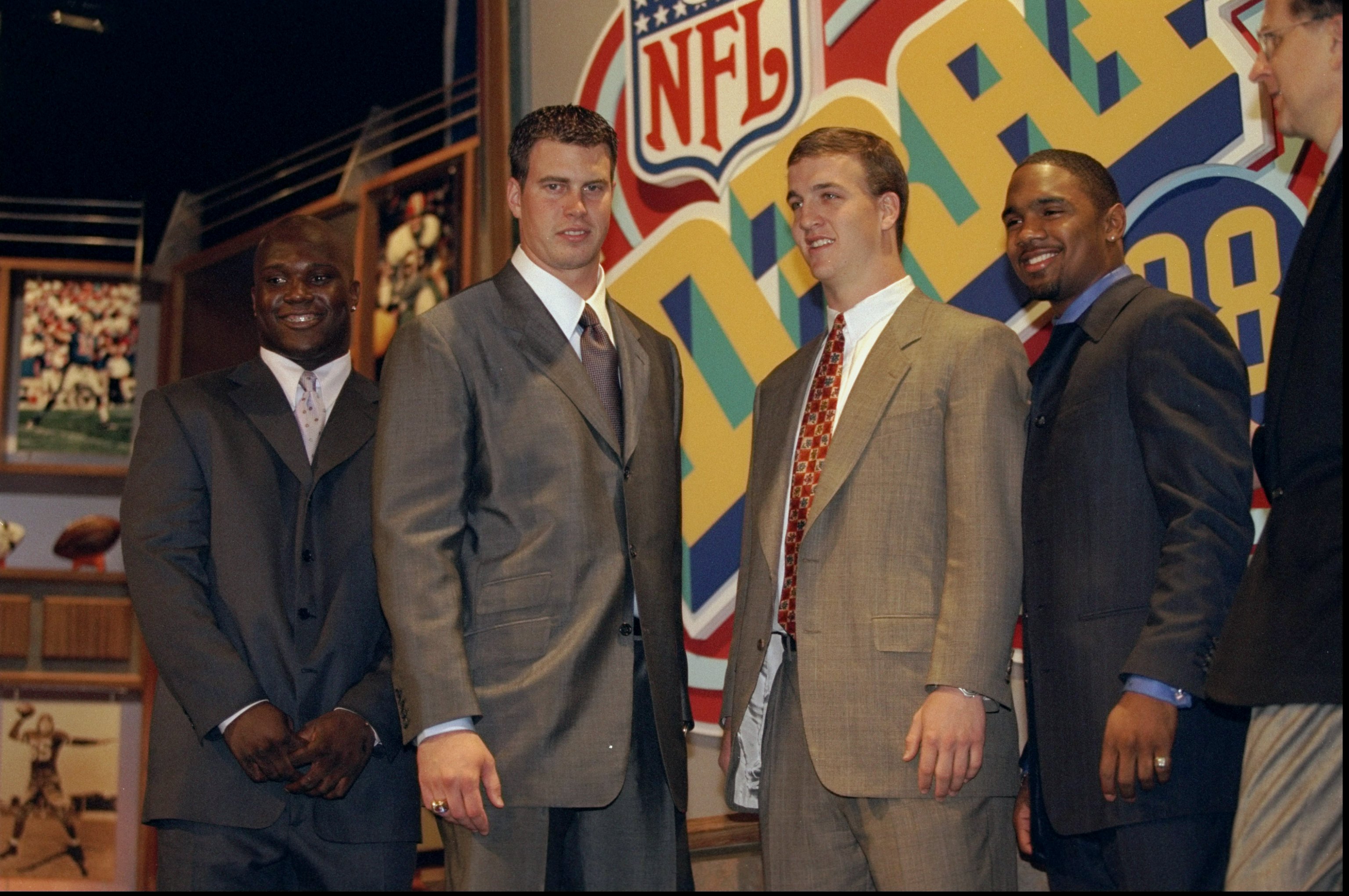 Running back Curtis Enis, defensive back Charles Woodson and quarterbacks Ryan Leaf and Peyton Manning stand together during the NFL draft at Madison Square Garden in New York City, NY