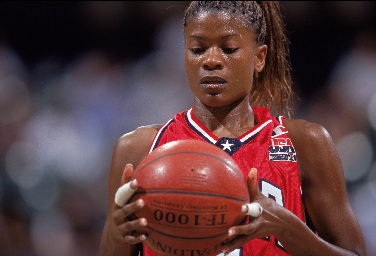 Sheryl Swoopes holds the ball during a USA Olympic Team training game in 2000.
