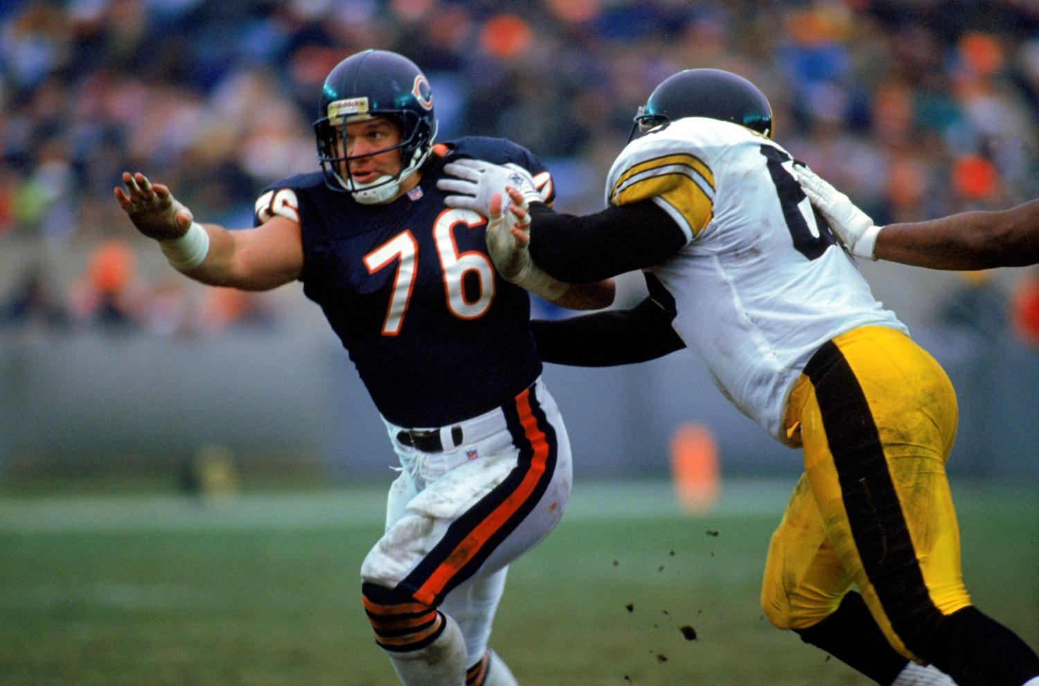Chicago Bears defensive lineman Steve McMichael runs past a Pittsburgh Steelers player.