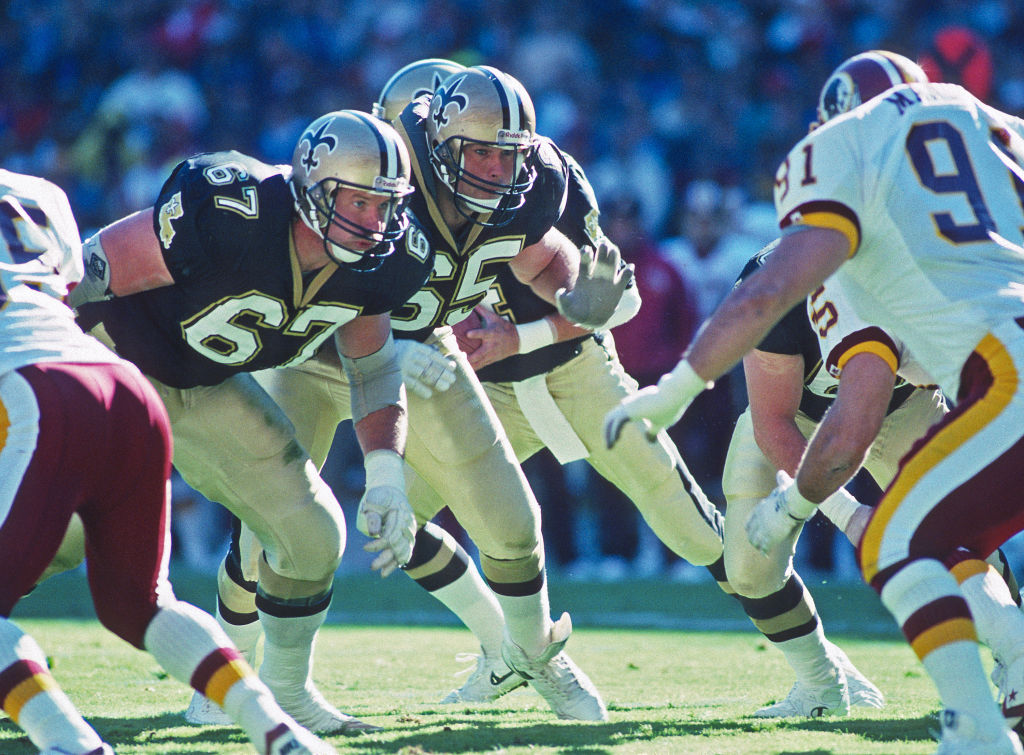 Saints offensive lineman Stan Brock (#67) and Steve Trapilo (#65) block against the then-Washington Redskins.