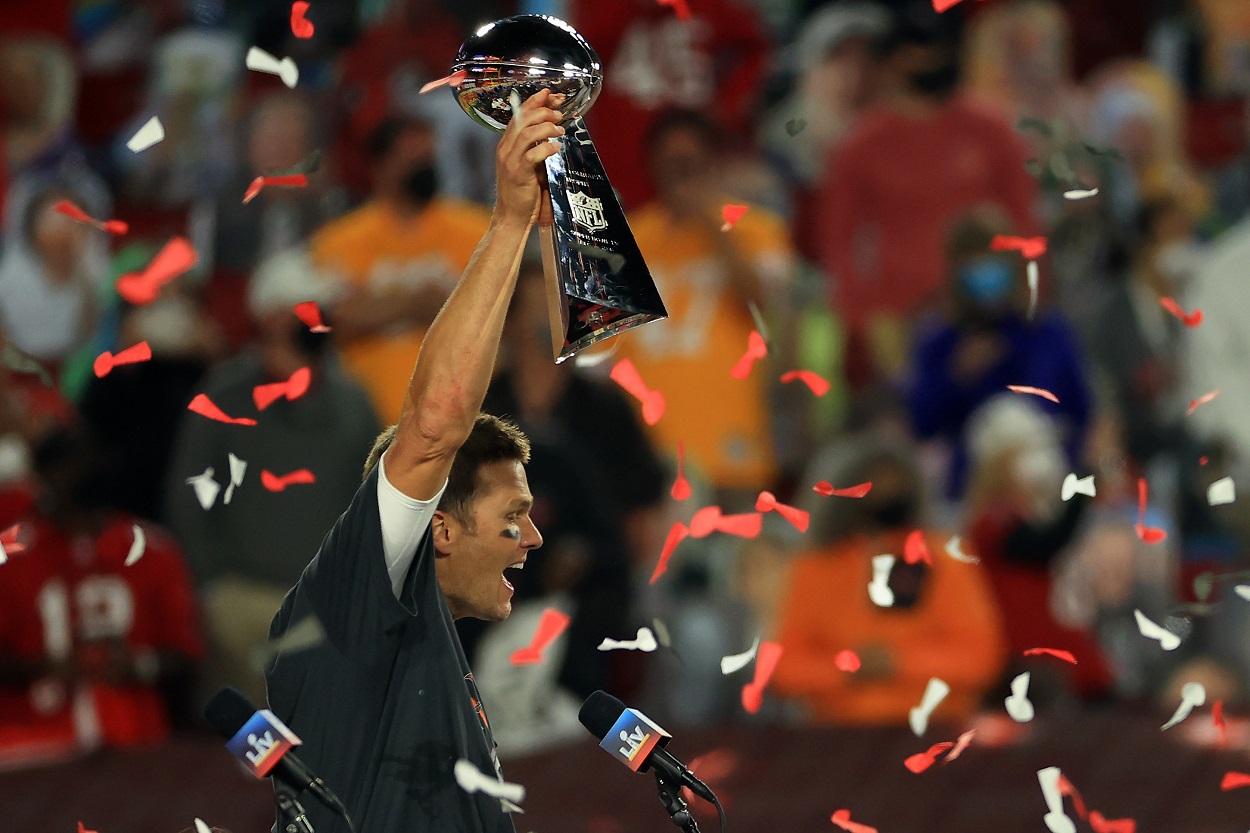 2000 NFL draft pick No. 199 Tom Brady celebrates his seventh Super Bowl victory