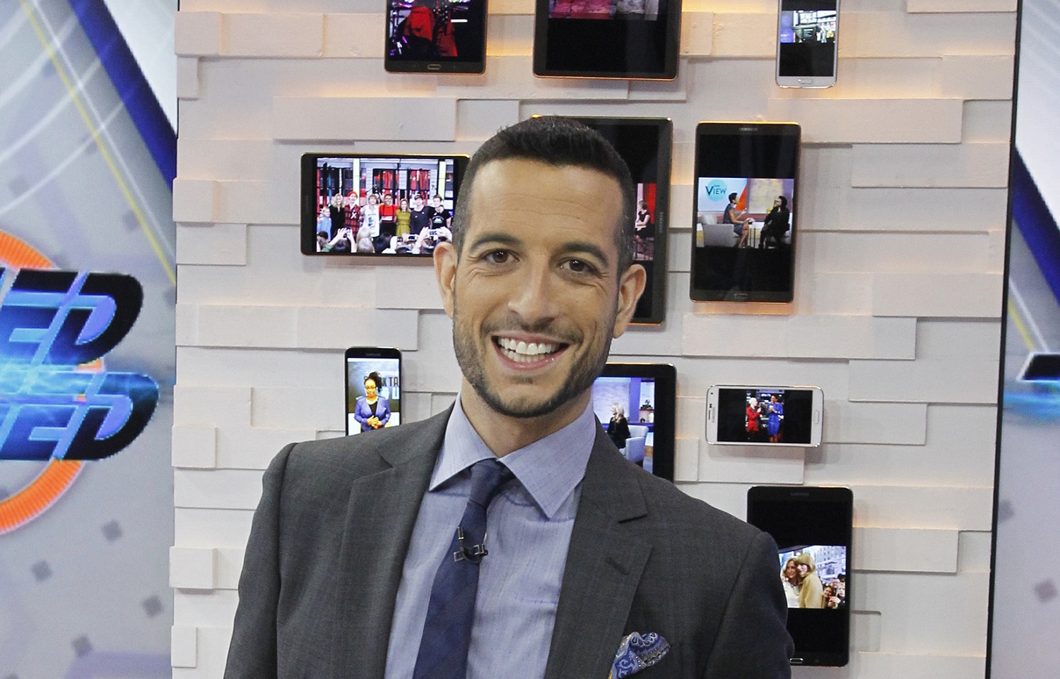 Tony Reali worked with Michael Wilbon and Tony Kornheiser on 'Pardon the Interruption' for more than a decade while also hosting 'Around the Horn' on ESPN. | Lou Rocco/Walt Disney Television via Getty Images.