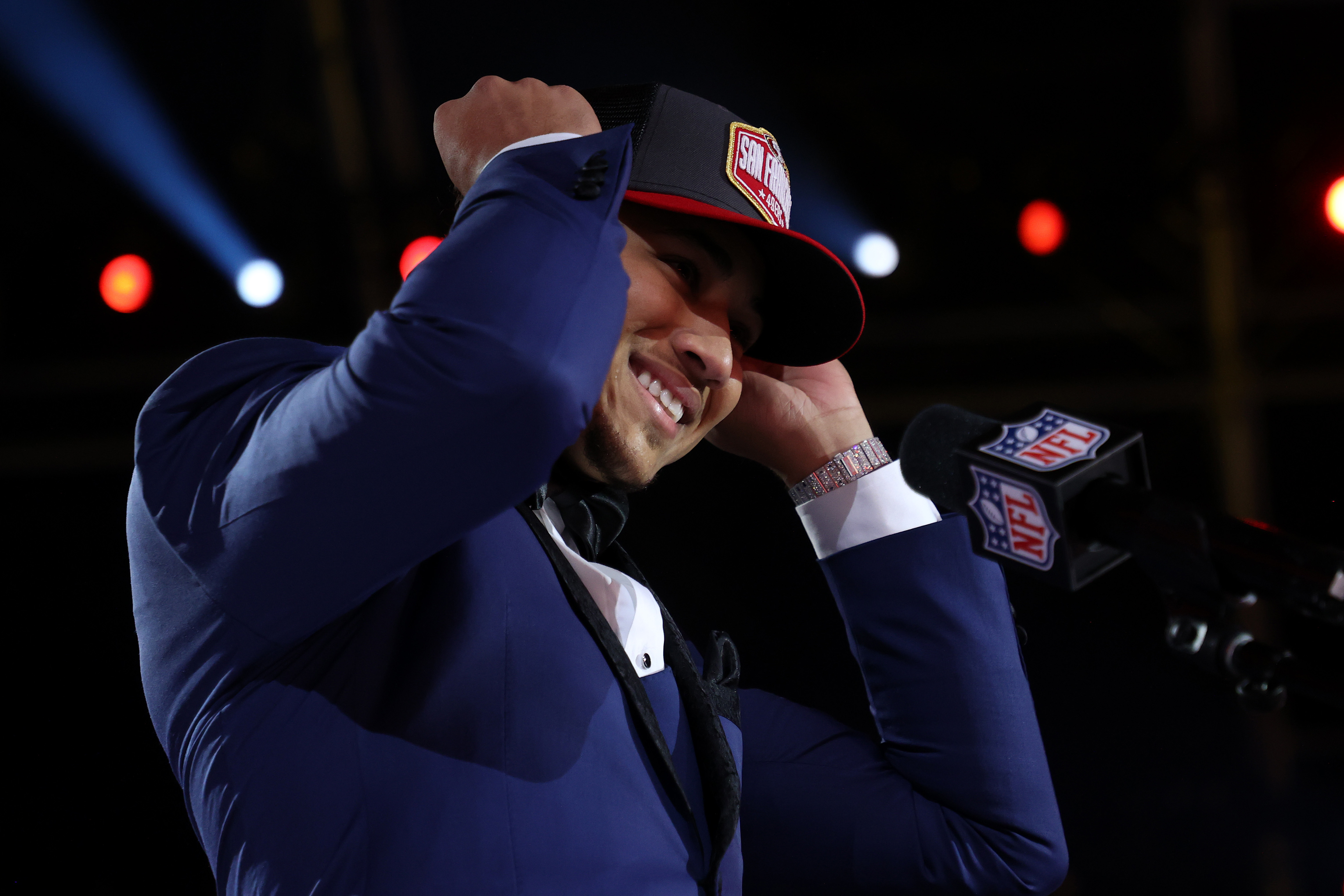 Trey Lance speaks onstage after being selected third by the San Francisco 49ers during round one of the 2021 NFL Draft at the Great Lakes Science Center on April 29, 2021 in Cleveland, Ohio.