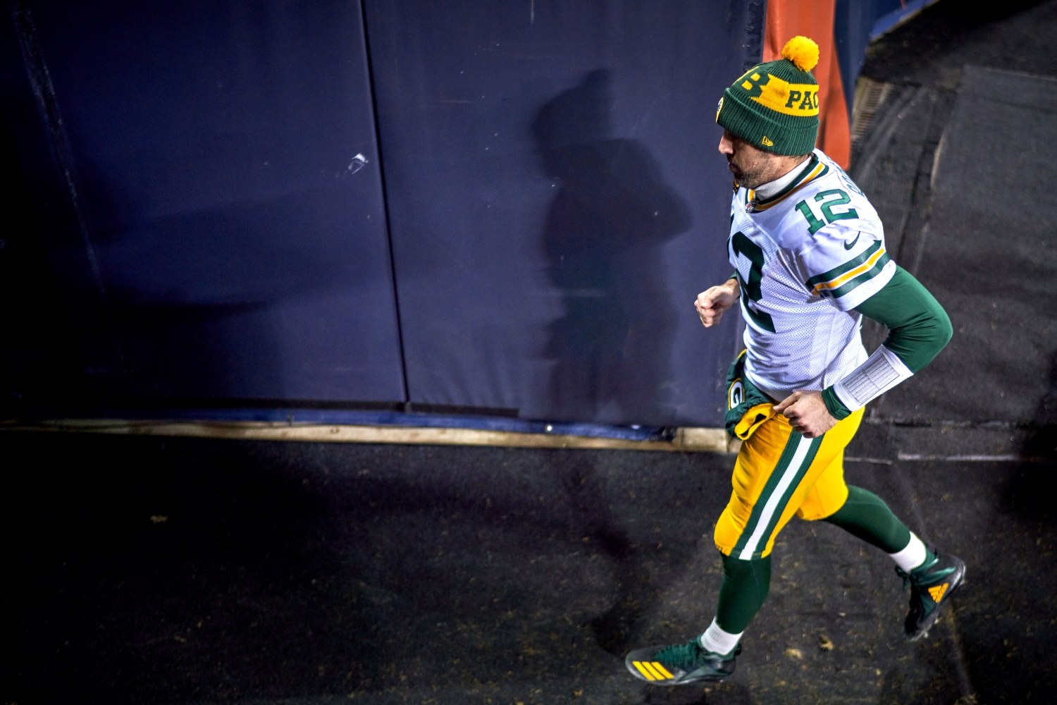 Green Bay Packers quarterback Aaron Rodgers exits the field.
