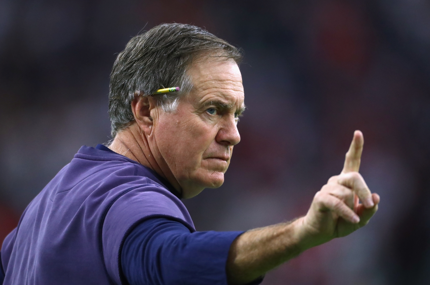 New England Patriots coach Bill Belichick signals to his team before Super Bowl 51 against the Atlanta Falcons.
