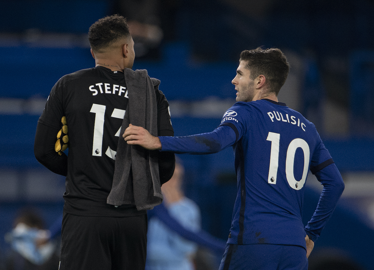USA team-mates Christian Pulisic of Chelsea and Zack Steffen of Manchester City walk from the pitch atter the Premier League match between Chelsea and Manchester City at Stamford Bridge on January 03, 2021 in London, England.