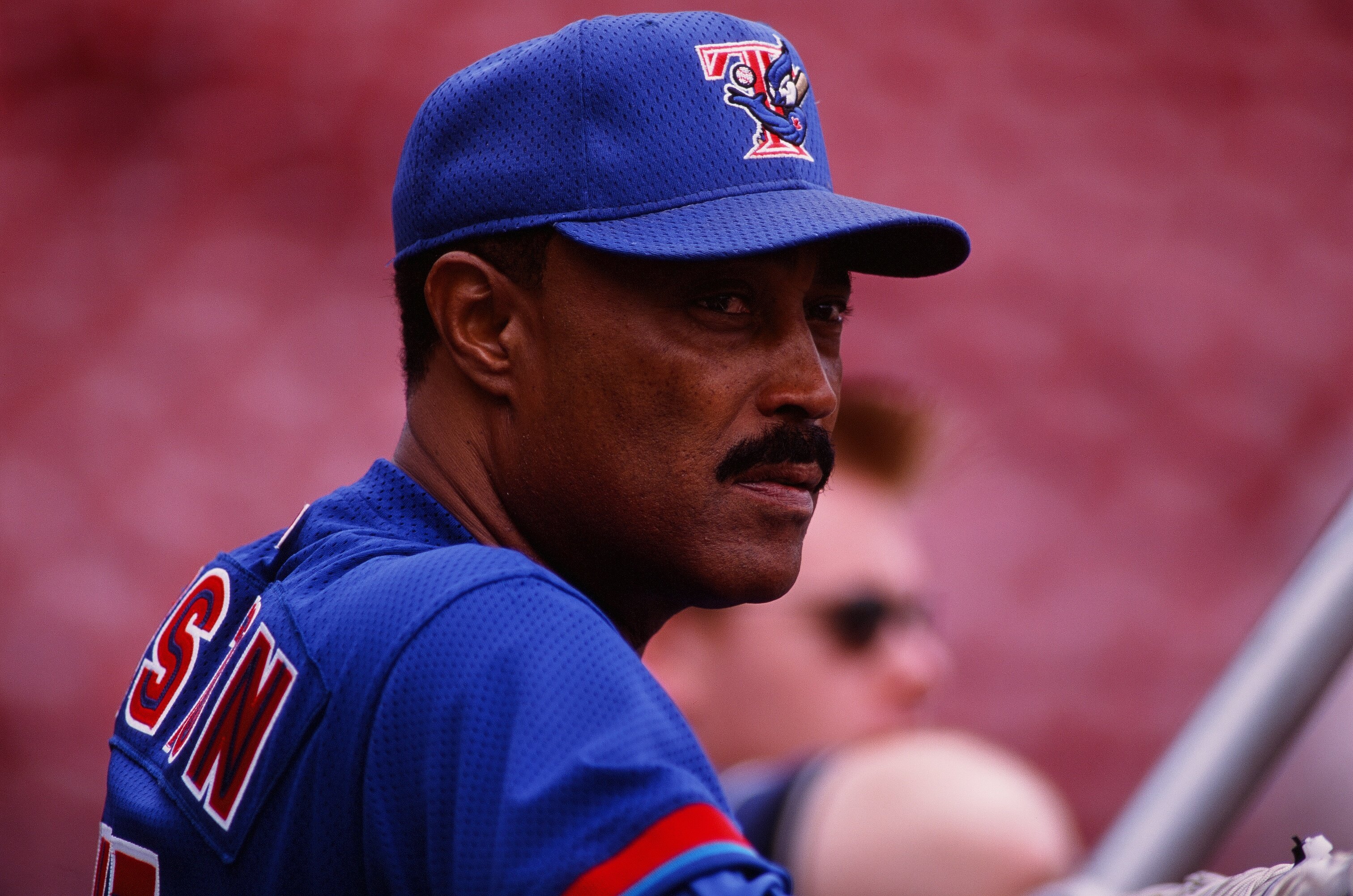 Cito Gaston of the Toronto Blue Jays looks on from the dugout in 2000