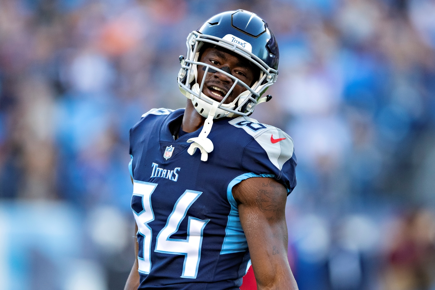 Tennessee Titans receiver Corey Davis looks on during a game.
