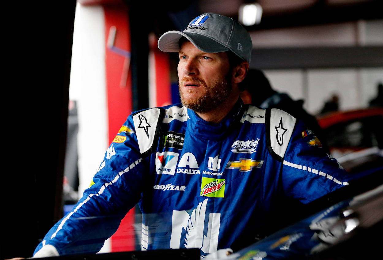 Dale Earnhardt Jr. standing in garage area