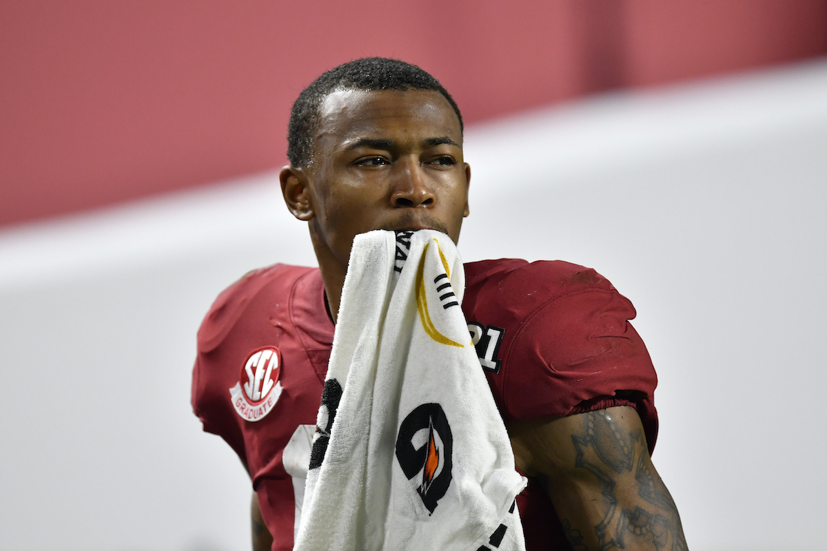 DeVonta Smith of the Alabama Crimson Tide looks on during the College Football Playoff National Championship football game