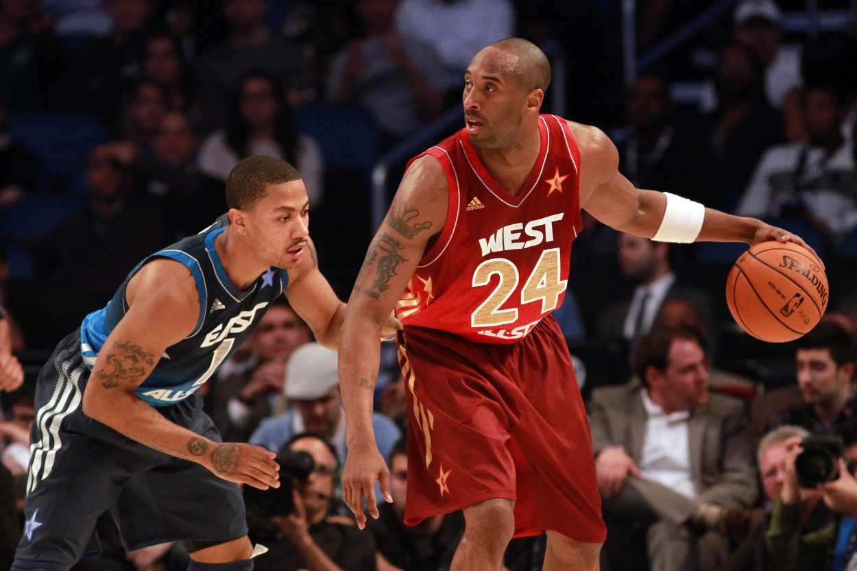 NBA stars Derrick Rose (L) and Kobe Bryant.
