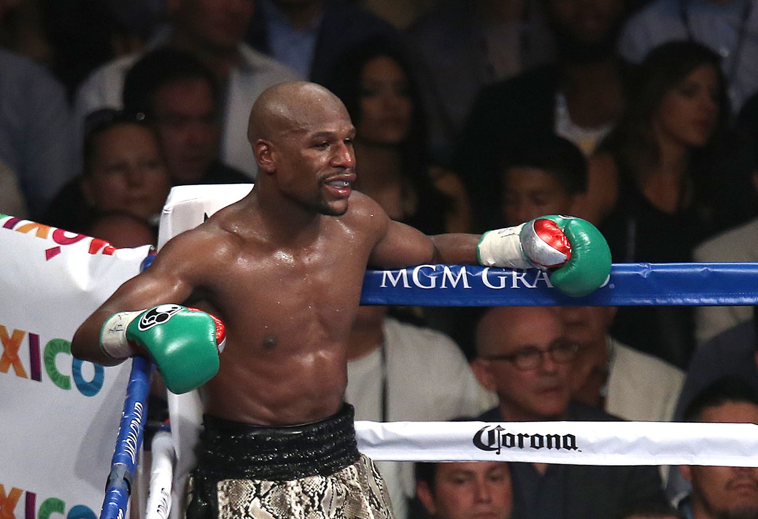 Floyd Mayweather Jr. waits in a neutral corner after throwing a low blow during his welterweight title fight against Marcos Maidana on Sept. 13, 2014.