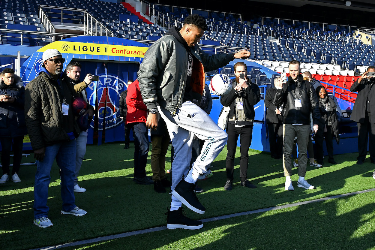 Giannis Antetokounmpo of the Milwaukee Bucks plays with the ball as he attends a team visit at Parc des Princes on January 22, 2020 in Paris, France.