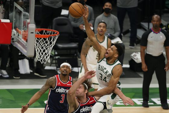 Milwaukee Bucks star Giannis Antetokounmpo skies for a dunk.