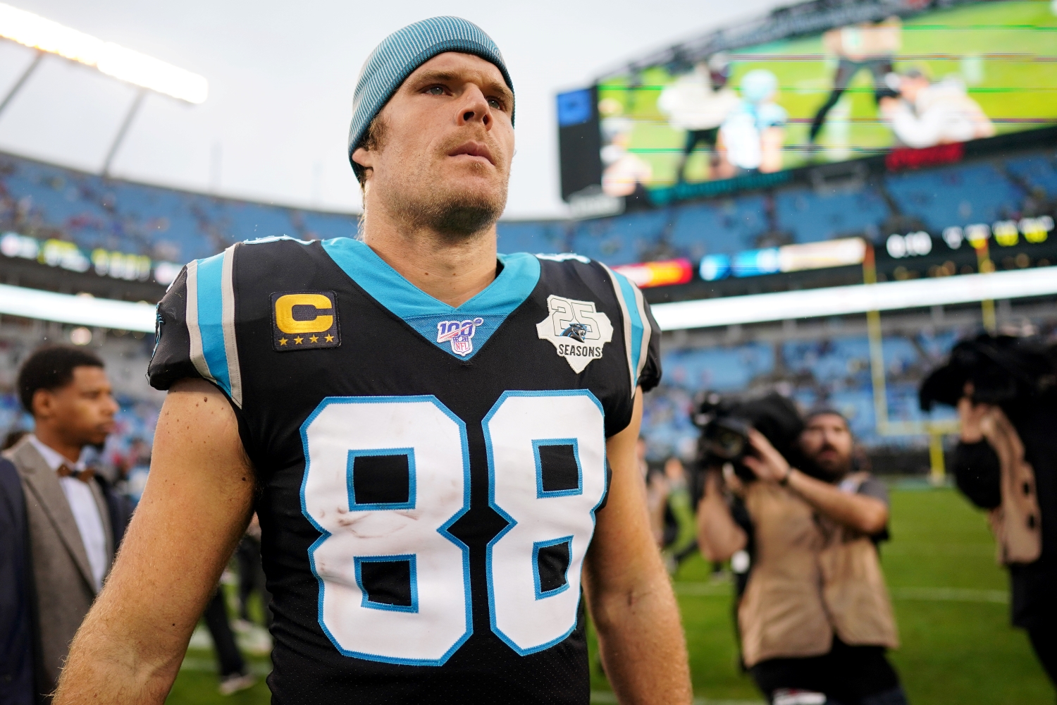 Carolina Panthers tight end Greg Olsen exits the field after a game.