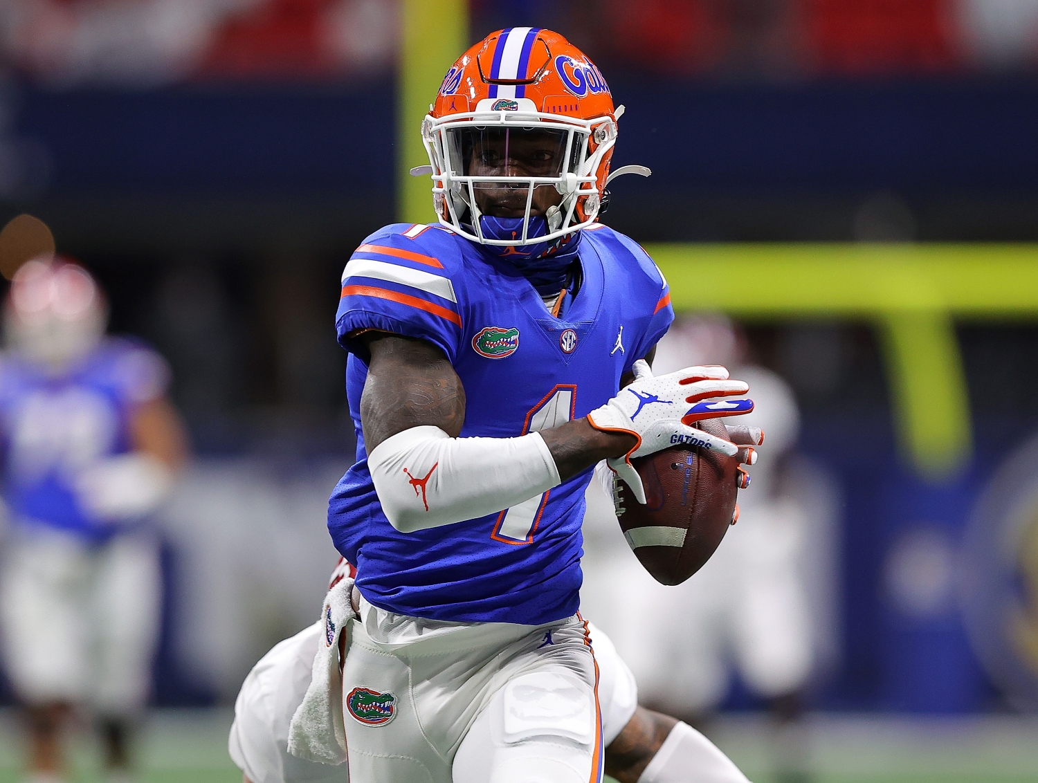 New York Giants first-round pick Kadarius Toney runs with the ball during a game from his college career with the Florida Gators.