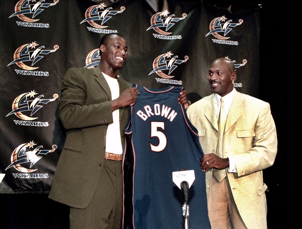 Kwame Brown and Michael Jordan at a Washington Wizards press conference in 2001