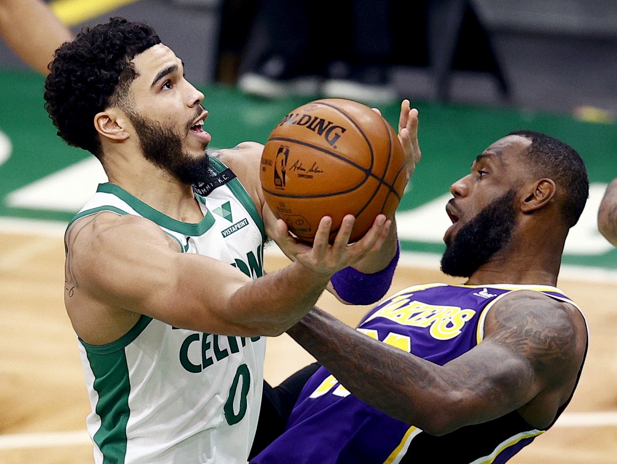 Jayson Tatum and LeBron James battle during a Lakers vs. Celtics matchup in January 2021